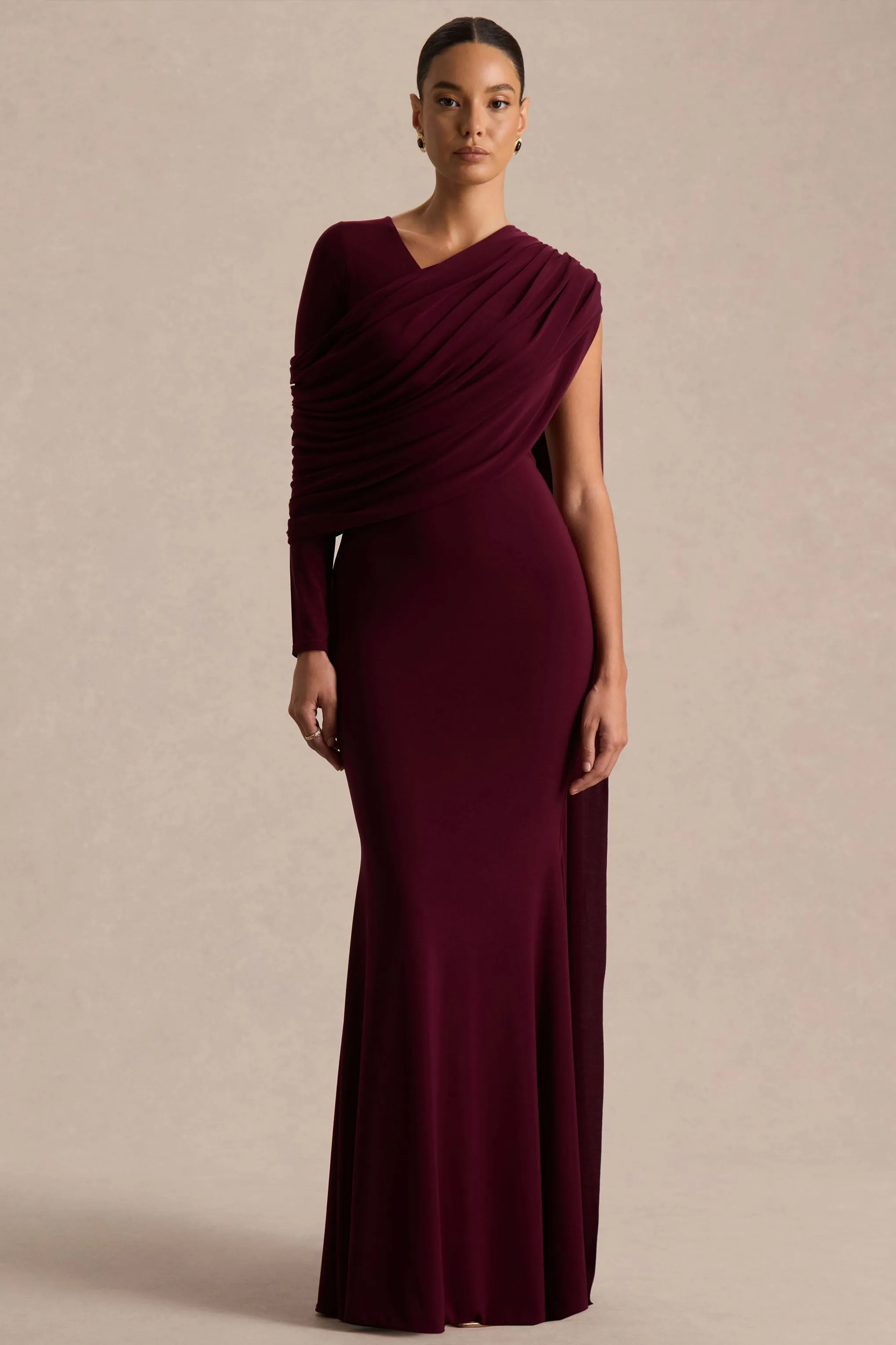 Rubelle | Burgundy Asymmetric Neck Maxi Dress With Draped Detailing sold by Club L London