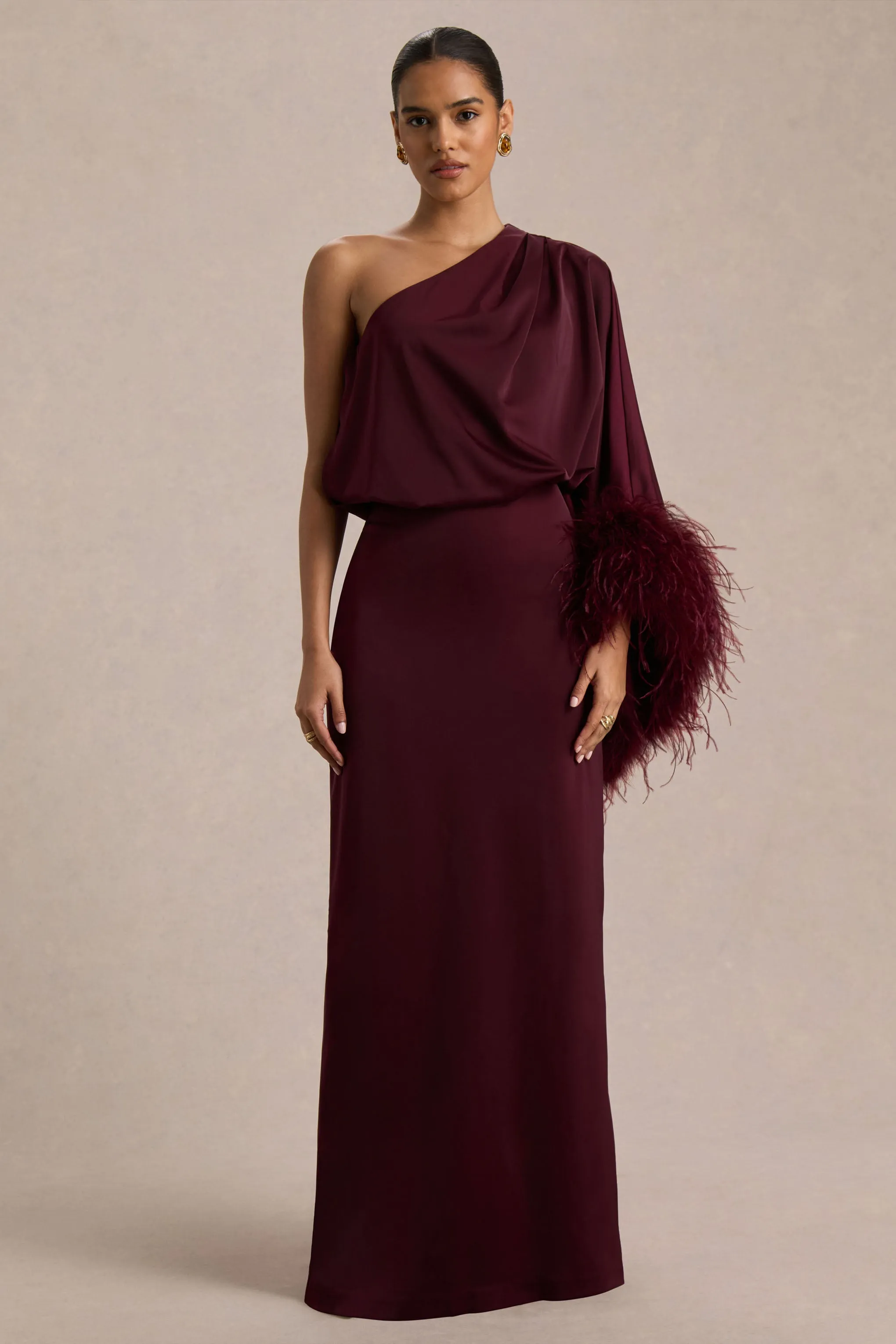 Felicity | Burgundy Satin Asymmetric-Neck Maxi Dress With Feather Detailing sold by Club L London