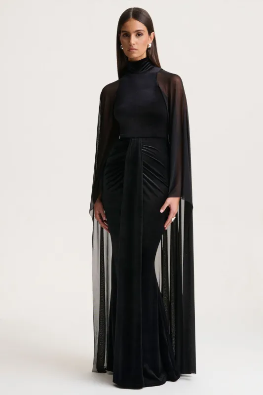 Adoring | Black Velvet High-Neck Maxi Dress With Cape sold by Club L London