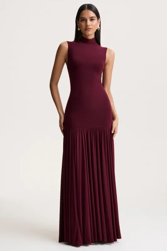 Gigi | Burgundy High-Neck Maxi Dress With Drop-Waist And Sheer Skirt sold by Club L London