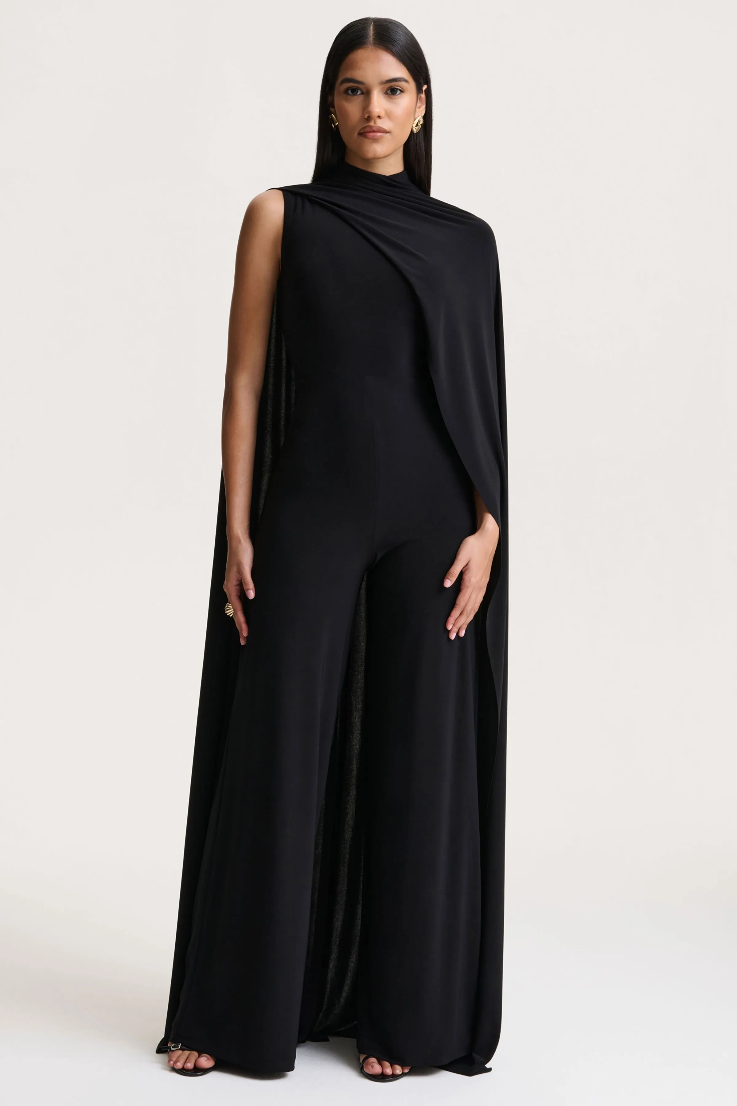 Seema | Black High-Neck Jumpsuit With Cape sold by Club L London