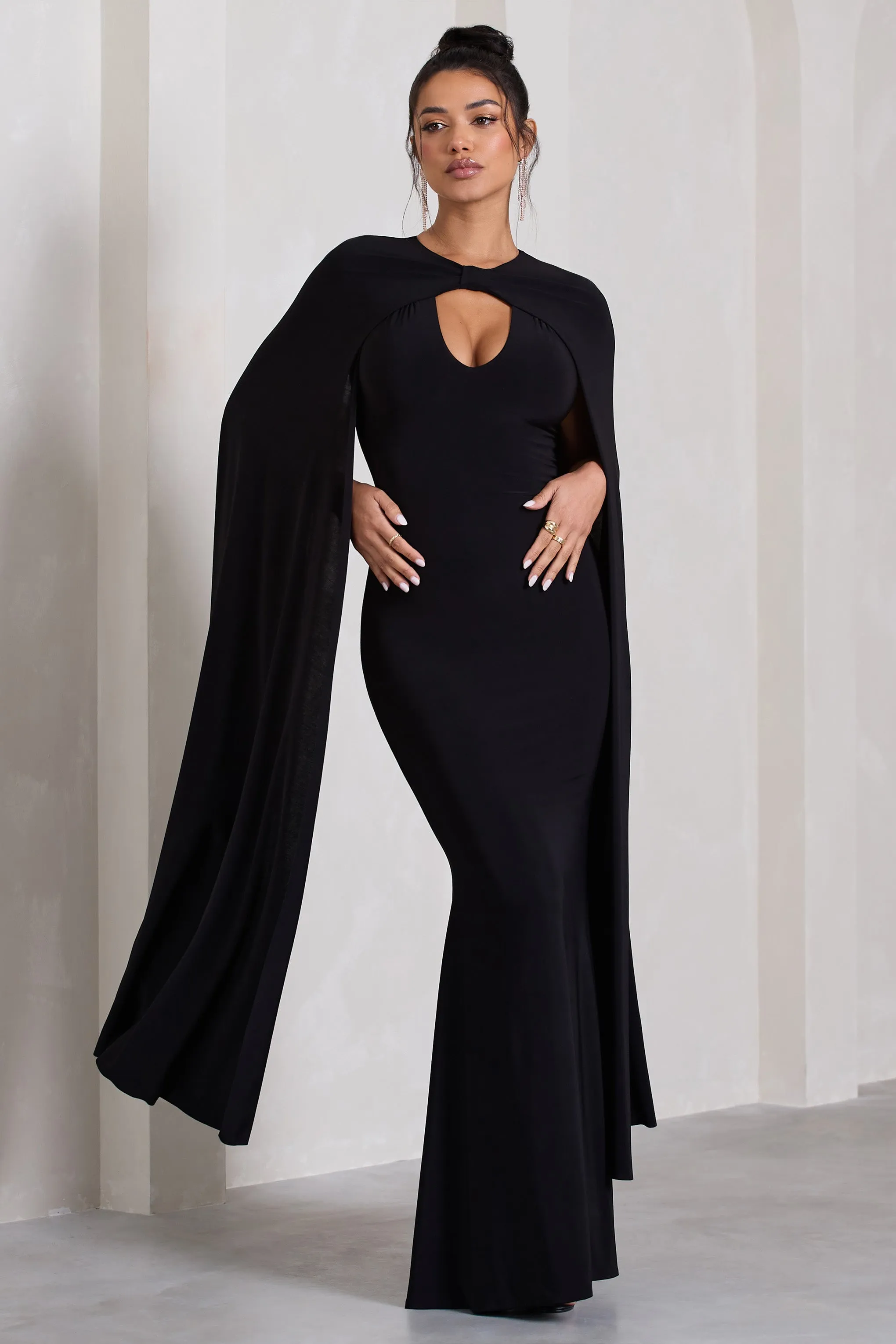 Standing Ovation | Black Plunge-Neck Cape Maxi Dress sold by Club L London