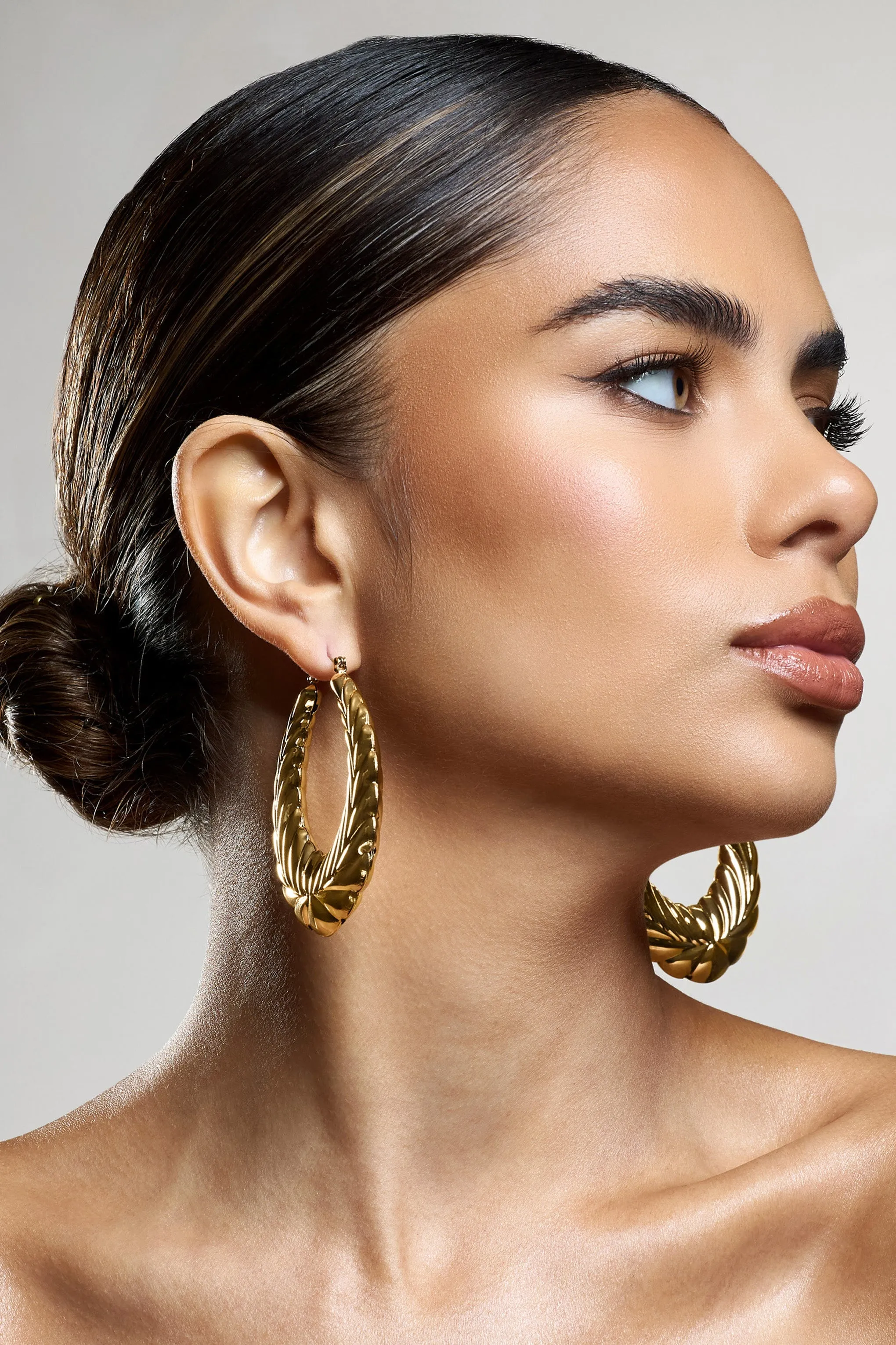 Rhode | Gold Chunky Hoop Earrings sold by Club L London