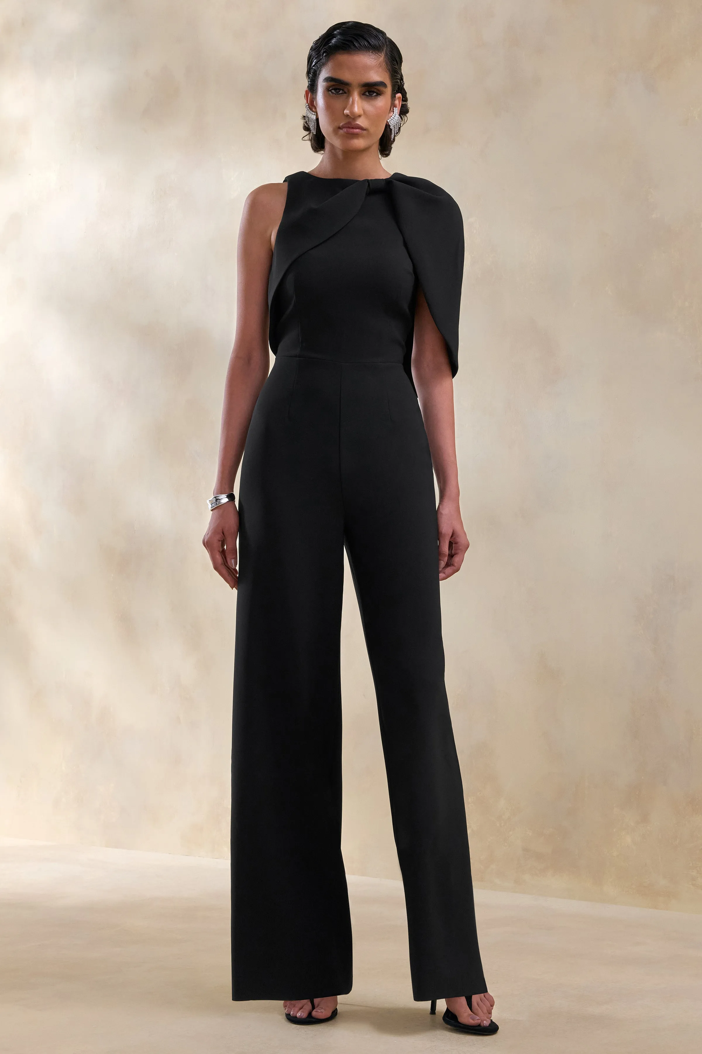 Quinley | Black Asymmetric-Neck Jumpsuit With Cape-Sleeve sold by Club L London