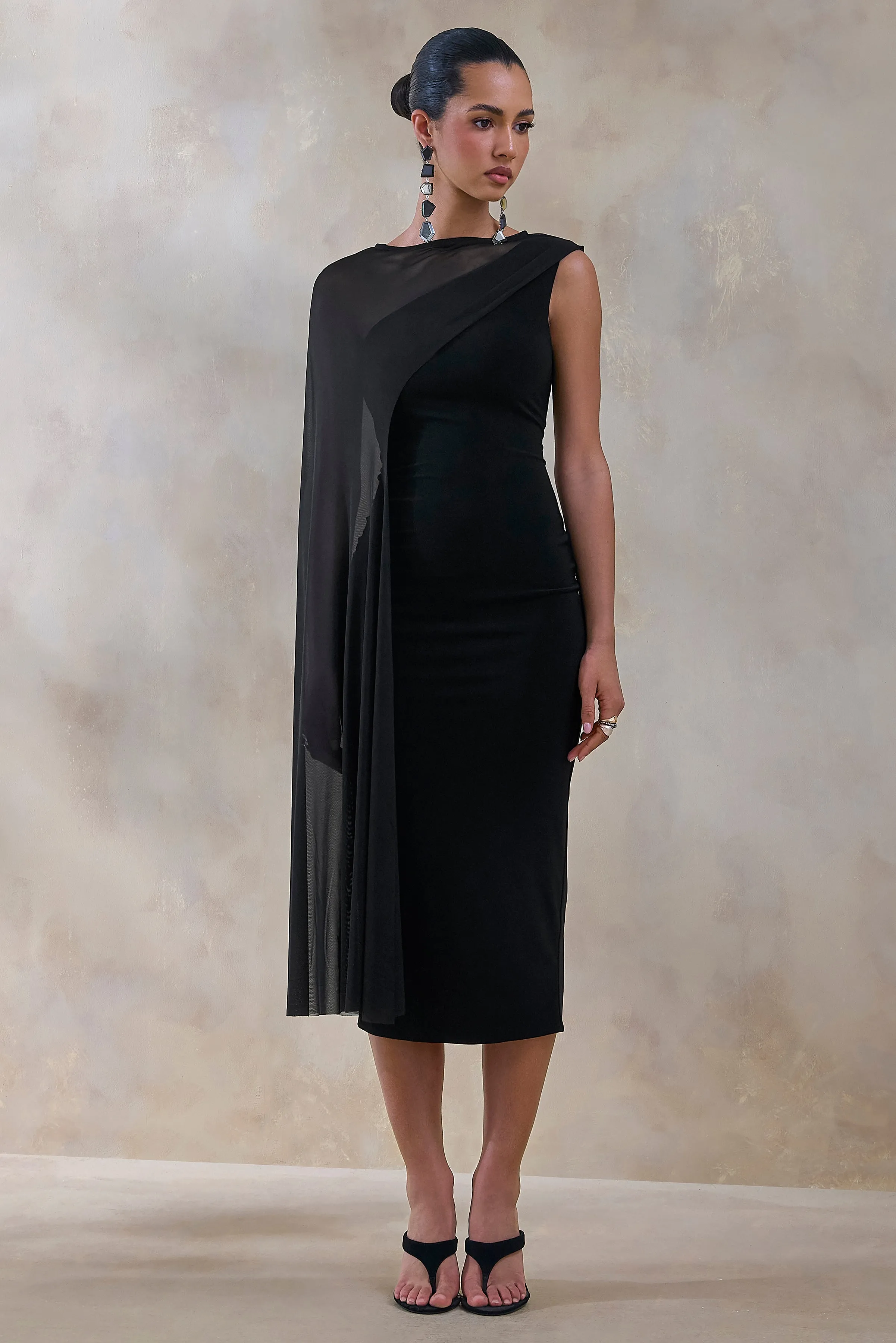 Caloria | Black Asymmetric-Neck Midi Dress With Mesh-Cape sold by Club L London