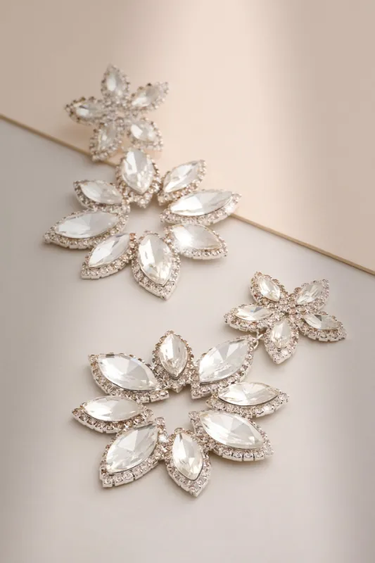Maura | Silver Diamante Flower Statement Earrings sold by Club L London