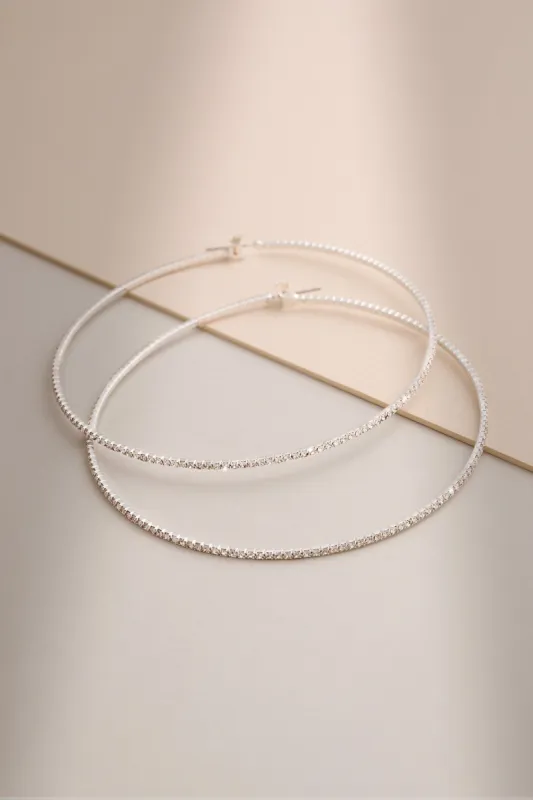 Rosey | Silver Diamante Thin Hoop Earrings sold by Club L London