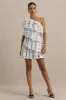 Orla | White Polka Dot Asymmetric Ruffled Mini Dress sold by Club L London
