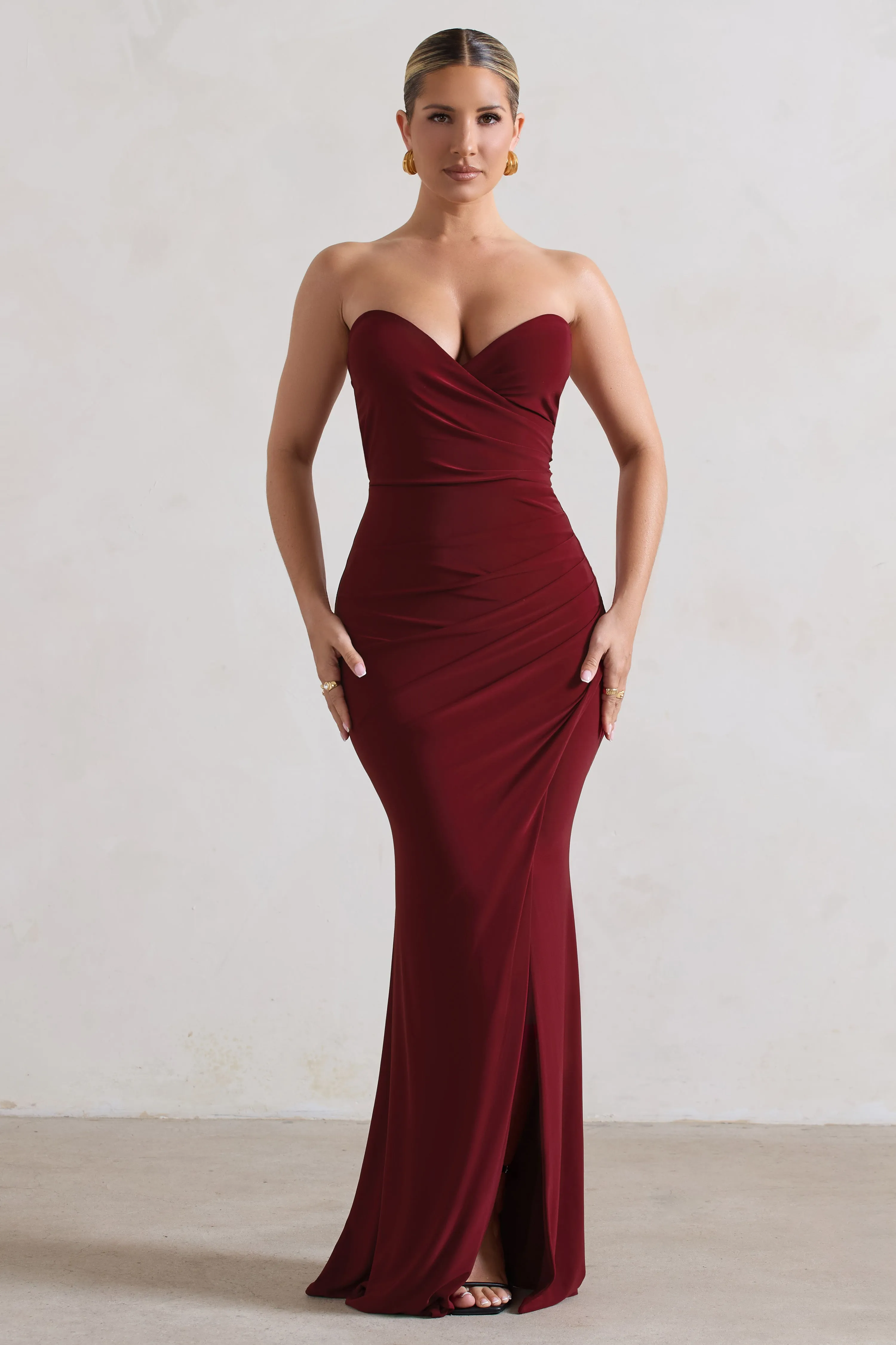 Saphira | Berry Gathered Corset Style Split Maxi Dress sold by Club L London