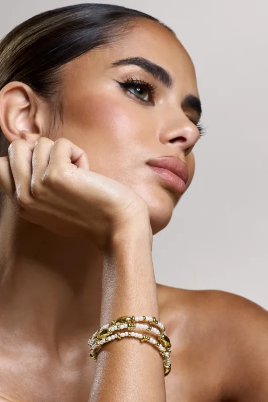 Raine | Gold Pearl Beaded Bracelet Set sold by Club L London
