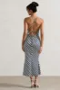 Aquarius | Navy Wave Print Satin Open-Back Midi Dress sold by Club L London