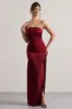 Confidence | Burgundy Satin Bandeau Pleated Split Maxi Dress sold by Club L London