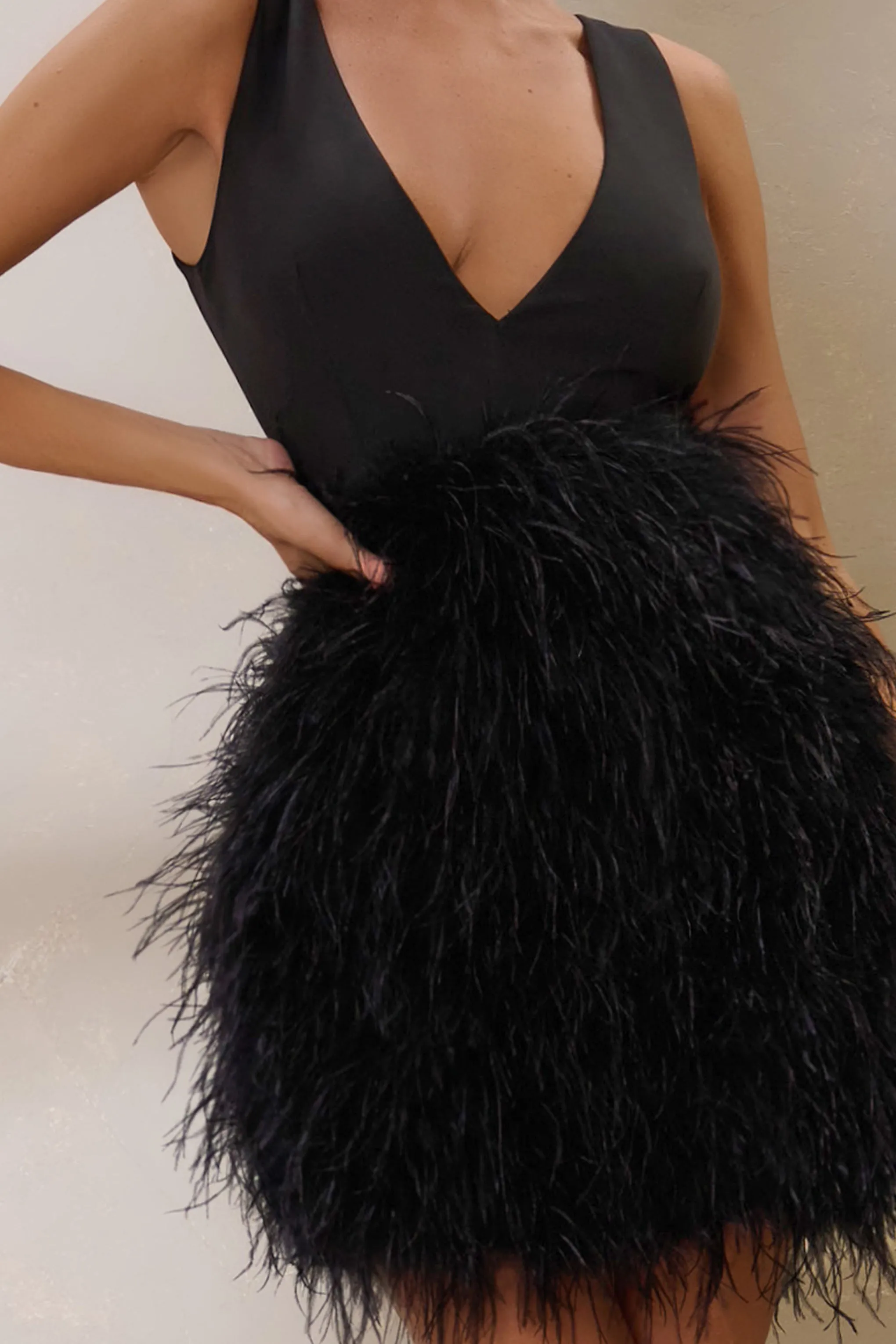 Flirt | Black Plunge Front Mini Dress With Feather Skirt sold by Club L London product image thumbnail 3