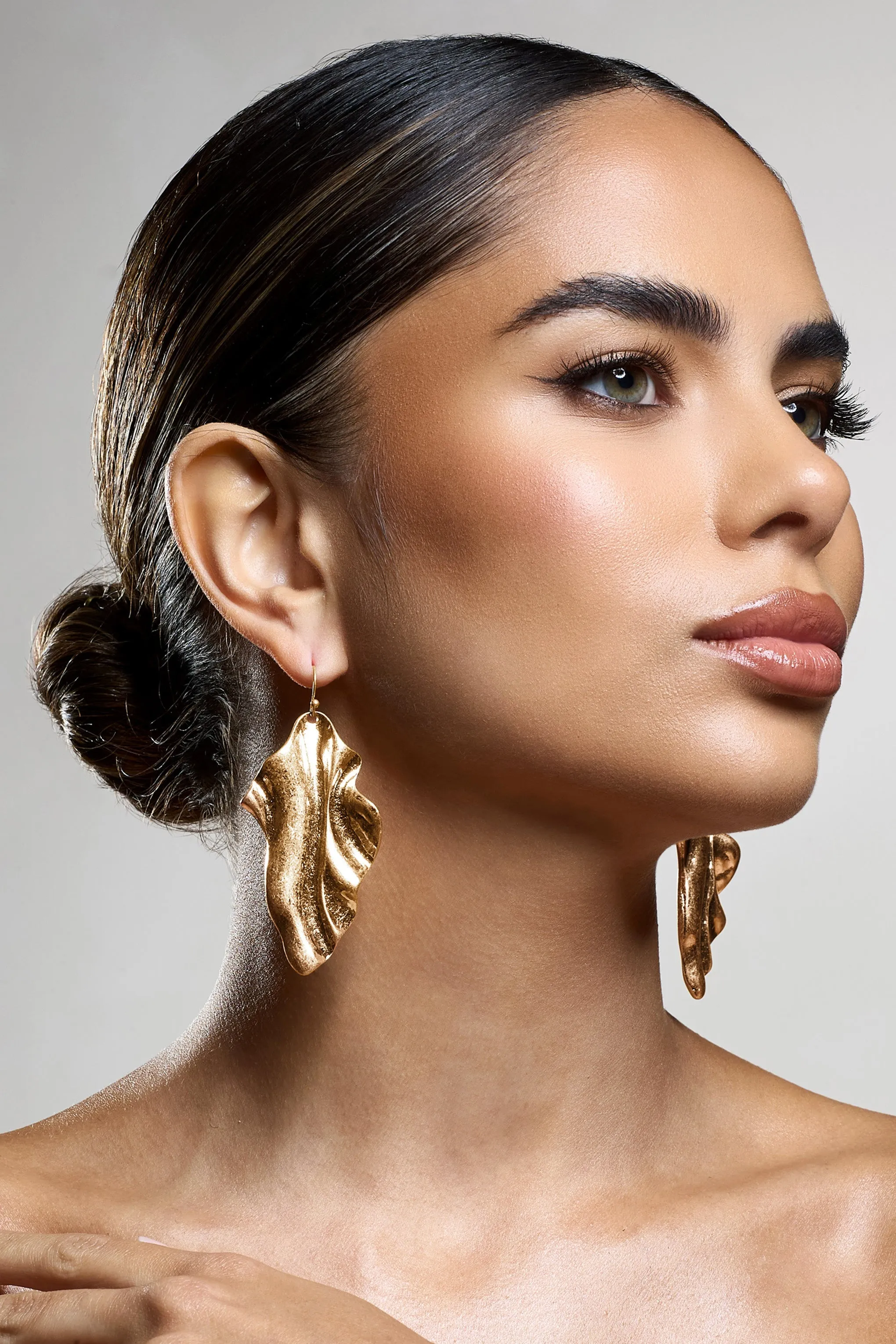 Eleni | Gold Abstract Drop Earrings sold by Club L London