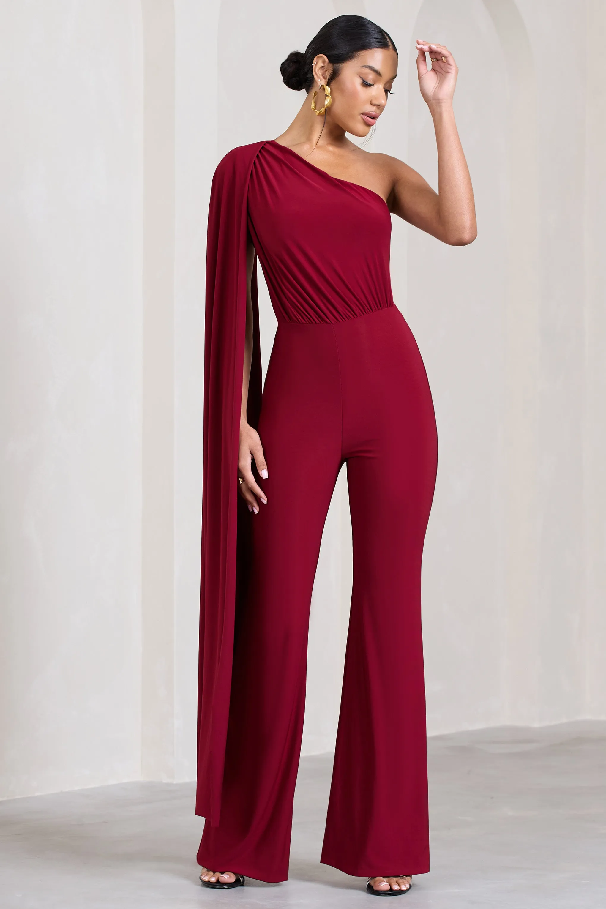 Aurora | Berry One Shoulder Cape Sleeve Jumpsuit sold by Club L London