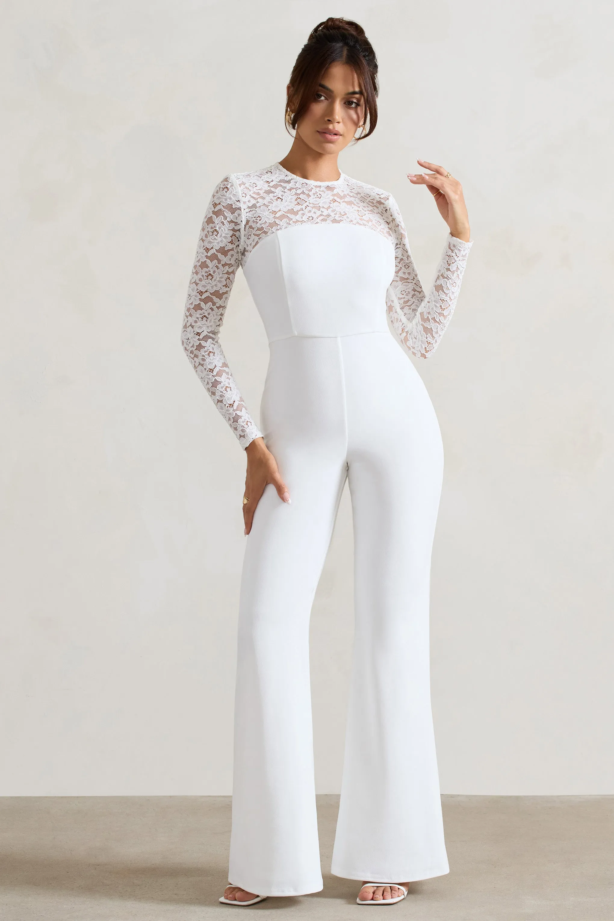Amari | White Lace Long-Sleeve Flared-Leg Jumpsuit sold by Club L London