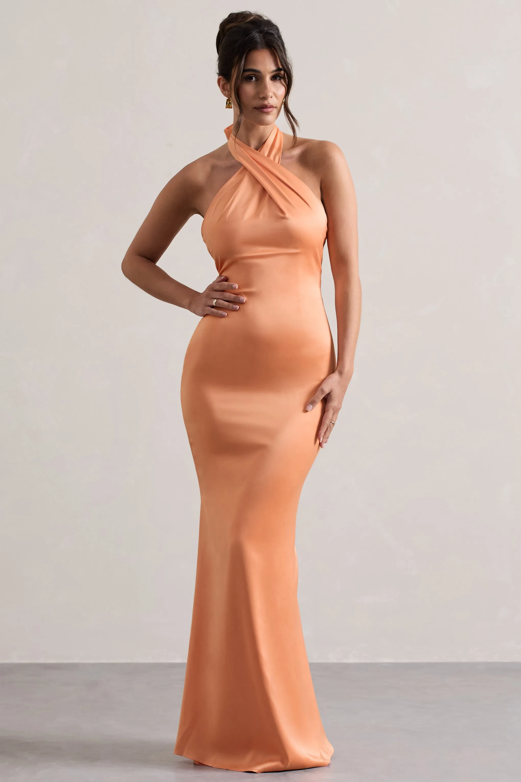 Unbeatable | Peach Satin Cross Over Halter-Neck Maxi Dress sold by Club L London