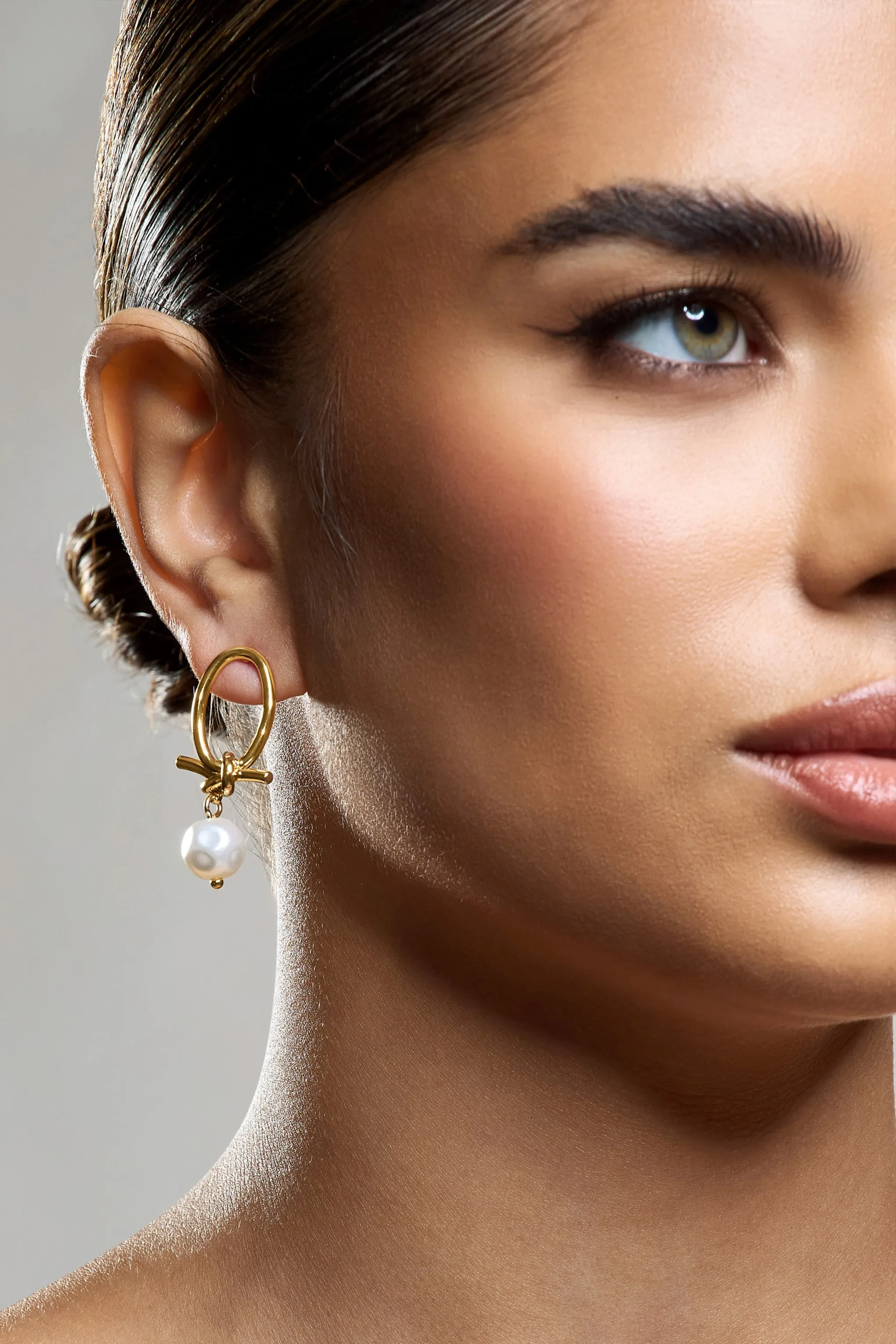 Ivory | Gold Pearl Dangle Earrings sold by Club L London product image thumbnail 4