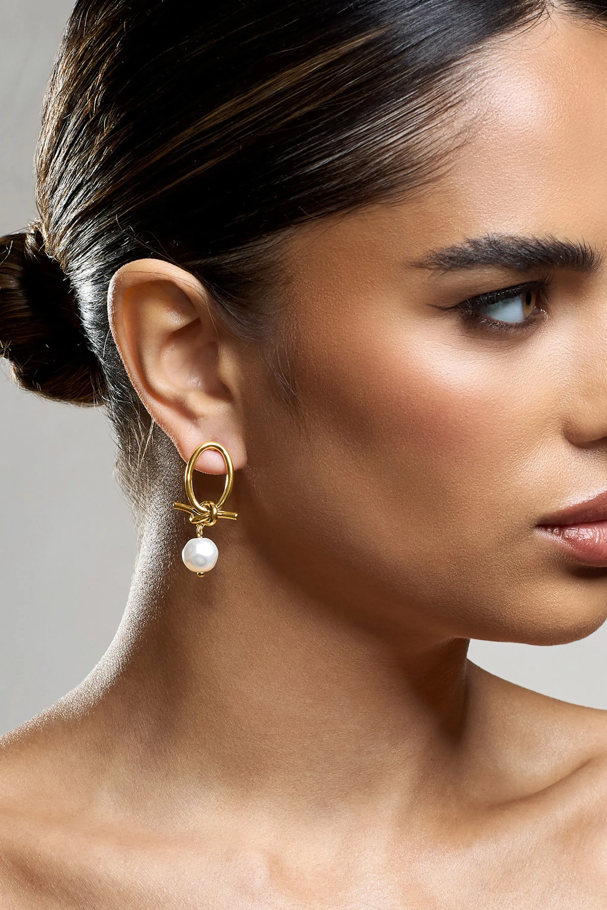 Ivory | Gold Pearl Dangle Earrings sold by Club L London product image thumbnail 3