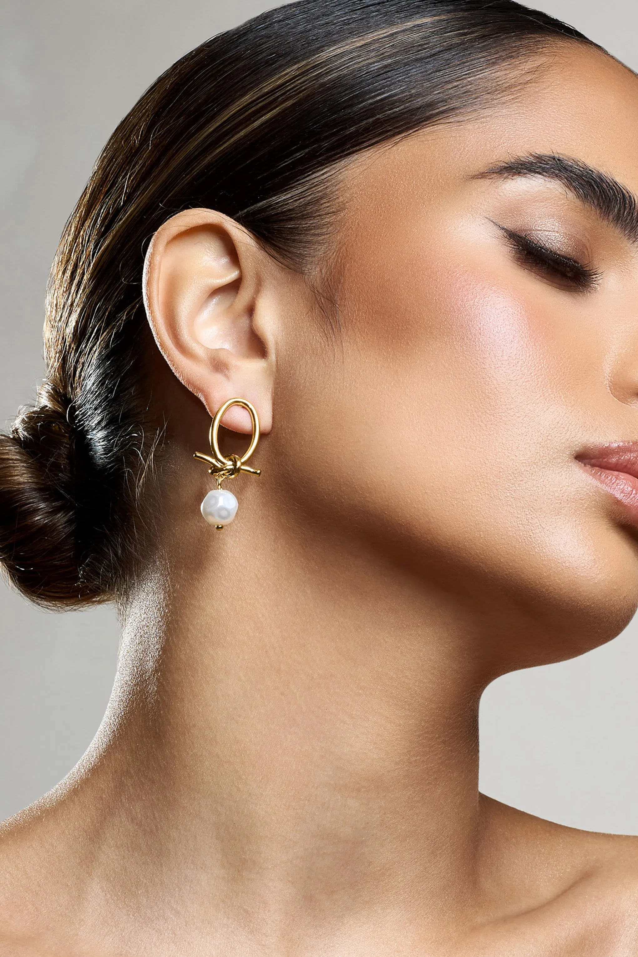 Ivory | Gold Pearl Dangle Earrings sold by Club L London product image thumbnail 2