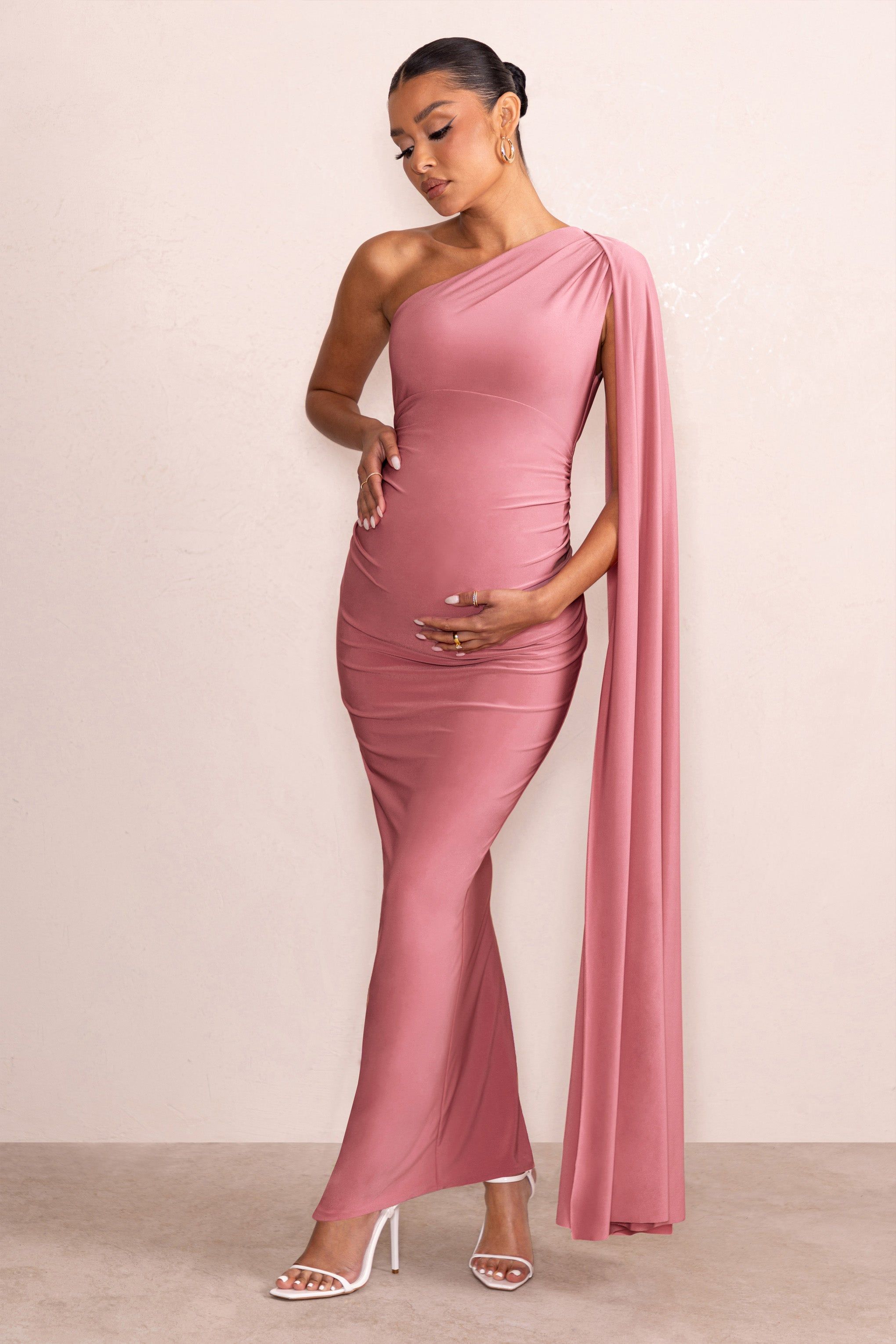 Amaryllis | Blush Pink Maternity One Shoulder Maxi Dress with Cape Sleeve sold by Club L London