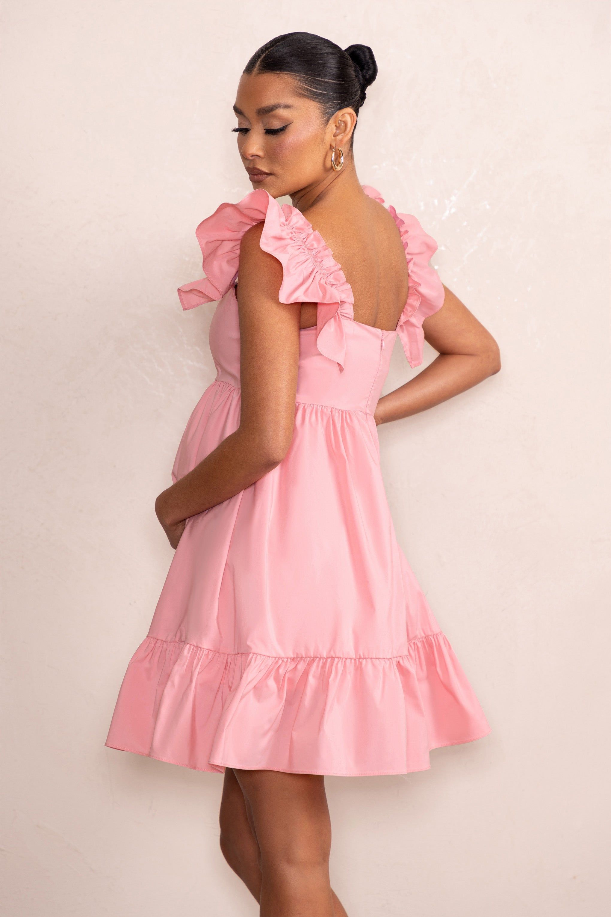 Dolly Daze | Blush Ruffle Sleeve Babydoll Maternity Mini Dress sold by Club L London product image thumbnail 2
