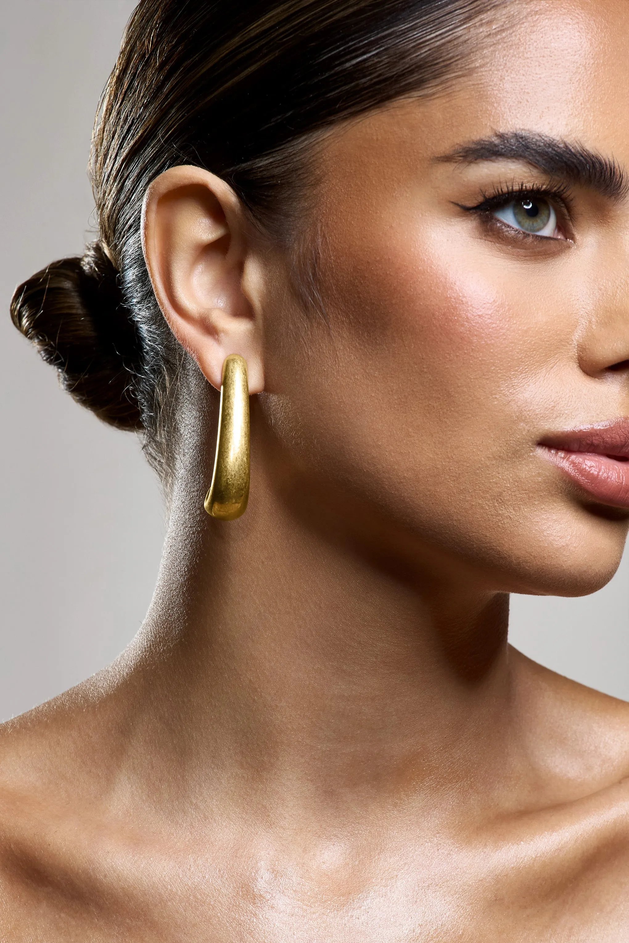 Zariah | Gold Curve Earrings sold by Club L London product image thumbnail 4