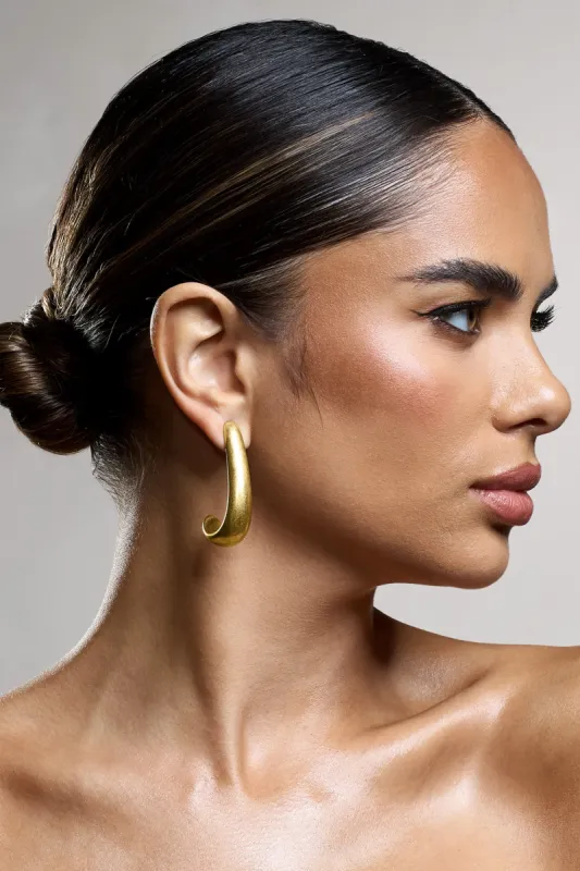 Zariah | Gold Curve Earrings sold by Club L London