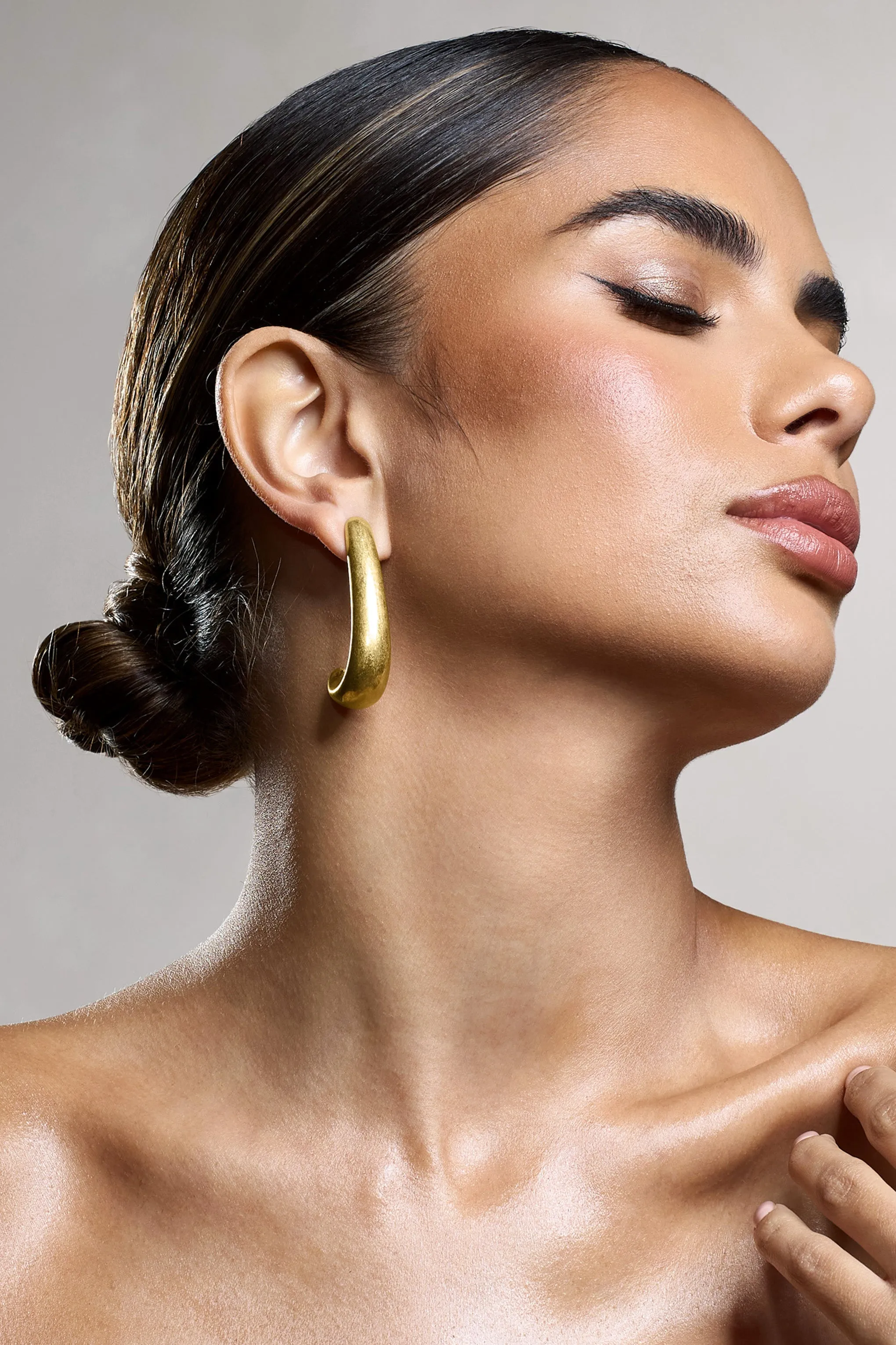 Zariah | Gold Curve Earrings sold by Club L London product image thumbnail 2