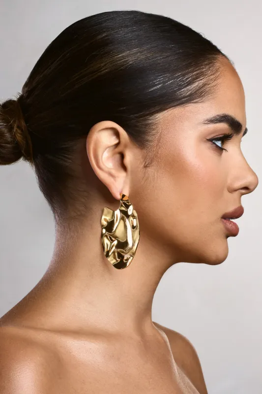 Ishani | Gold Textured Disc Earrings made by Club L London