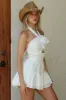 Georgi | White Broderie Ruffled Halter-Neck Playsuit With Corsage sold by Club L London