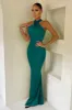 Unstoppable | Teal Cross Over Halter Neck Maxi Dress sold by Club L London
