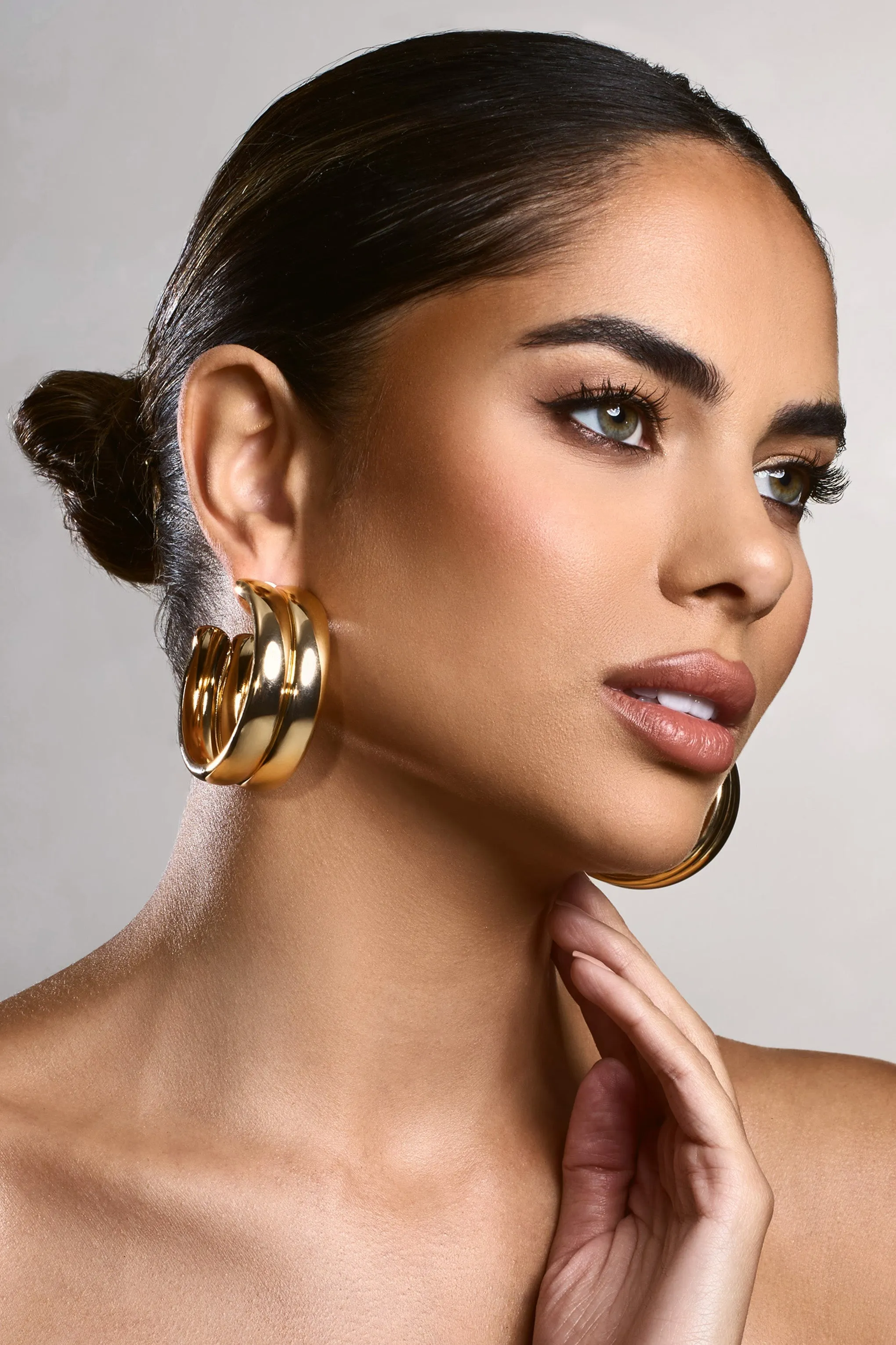 Eleasha | Gold Chunky Layered Hoop Earrings sold by Club L London product image thumbnail 3