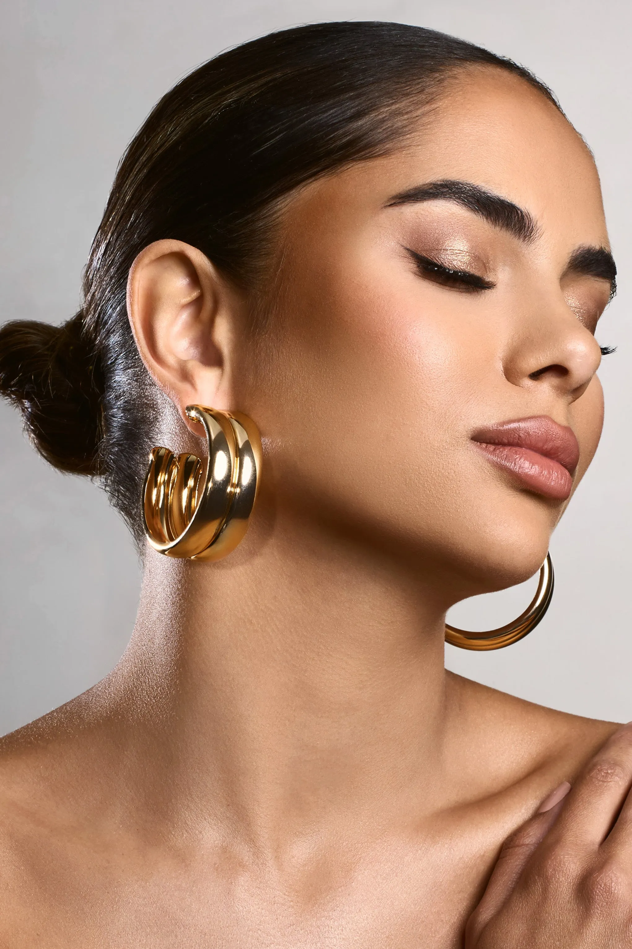 Eleasha | Gold Chunky Layered Hoop Earrings sold by Club L London