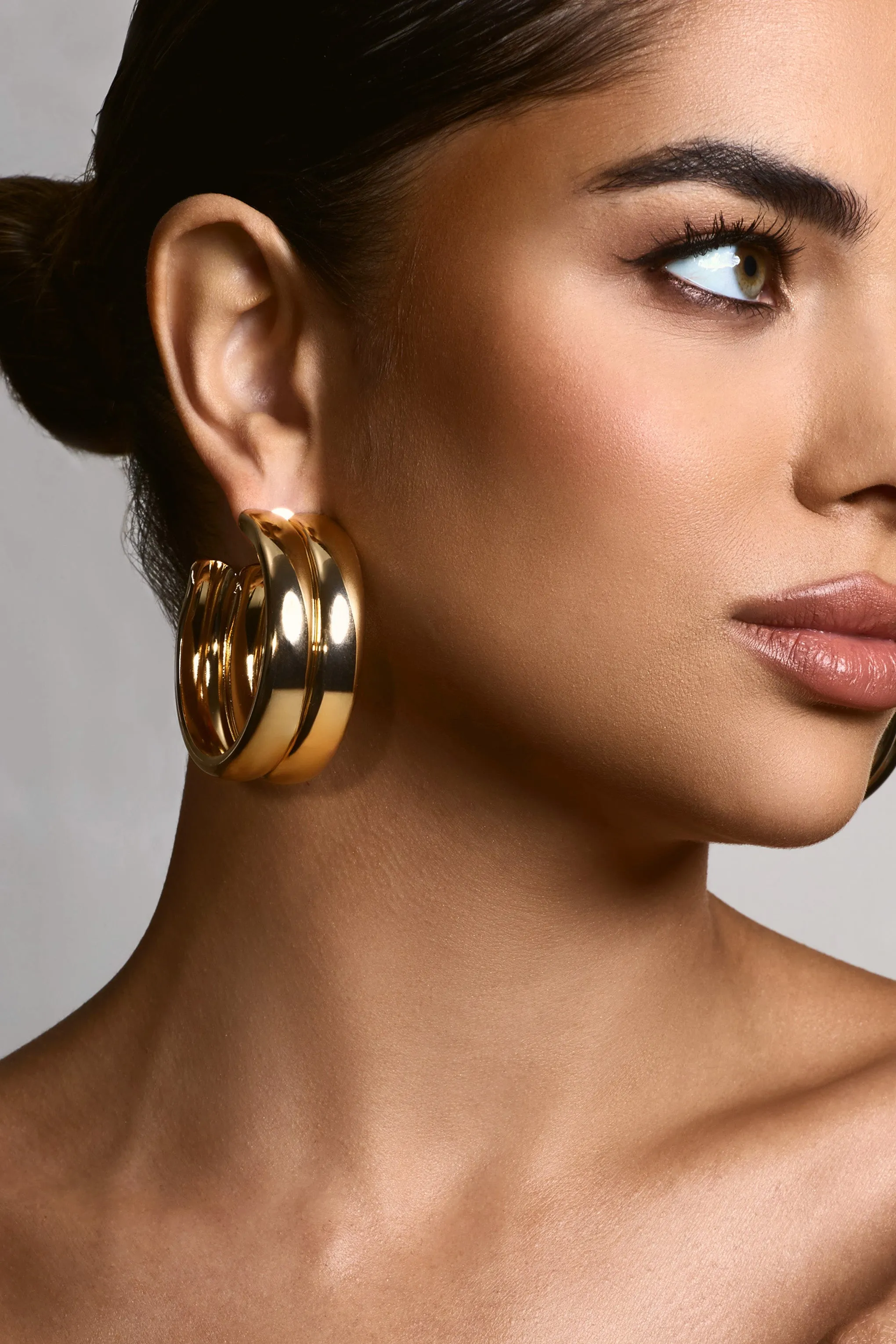 Eleasha | Gold Chunky Layered Hoop Earrings sold by Club L London product image thumbnail 5