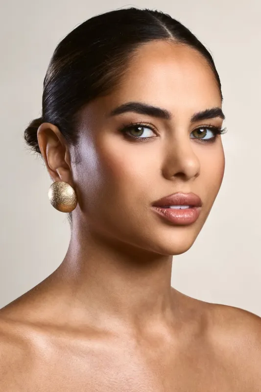 Dreamer | Gold Textured Chunky Circle Earrings sold by Club L London