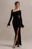 Cosmos | Black Asymmetric Long-Sleeve Split Maxi Dress sold by Club L London