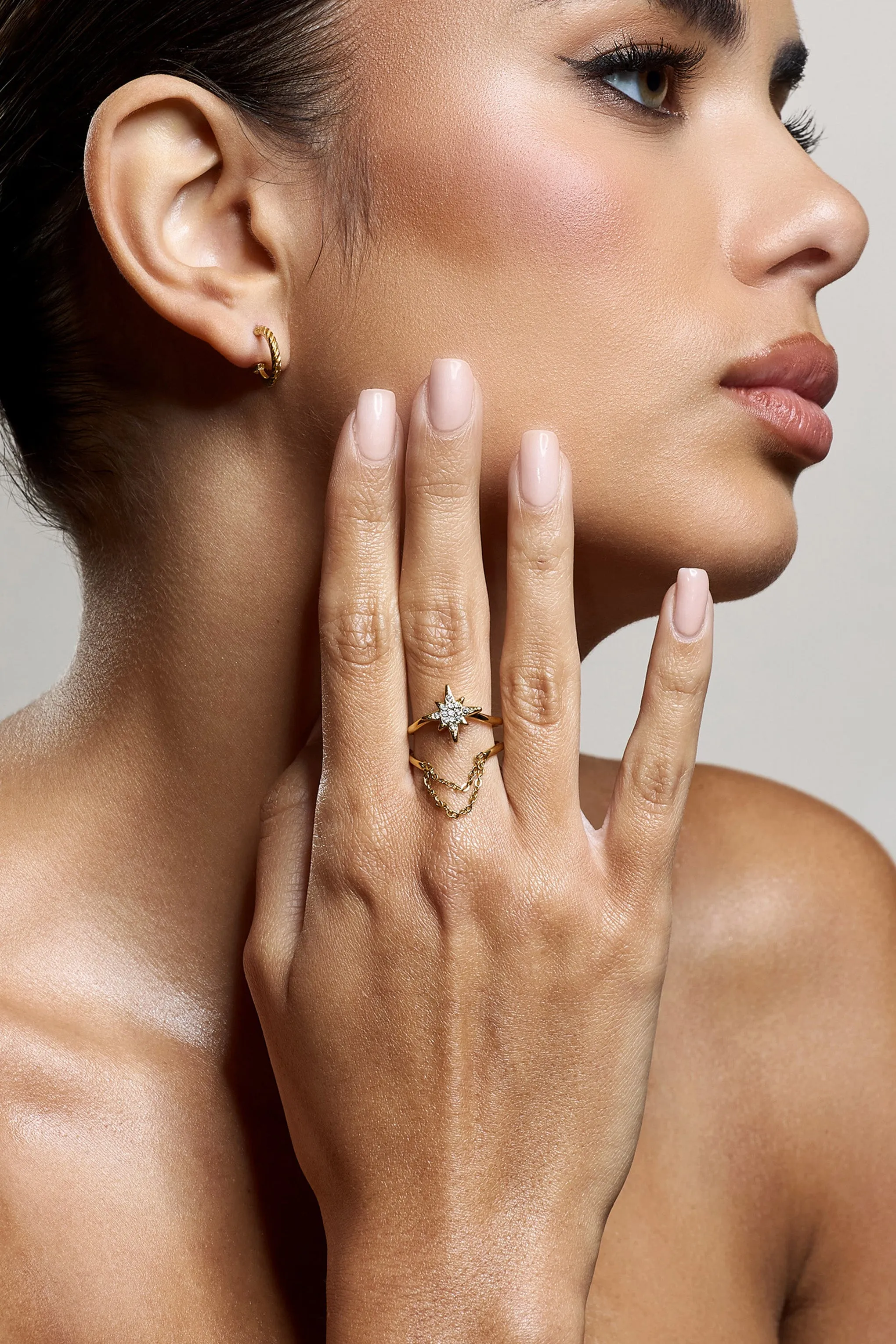 Aquila | Gold Diamante Layered Star Ring sold by Club L London