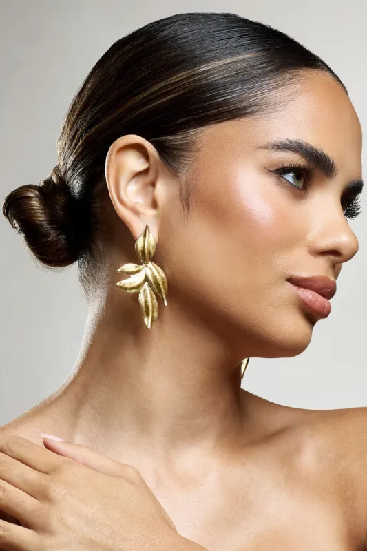 Phillipa | Gold Leaf Statement Earrings sold by Club L London