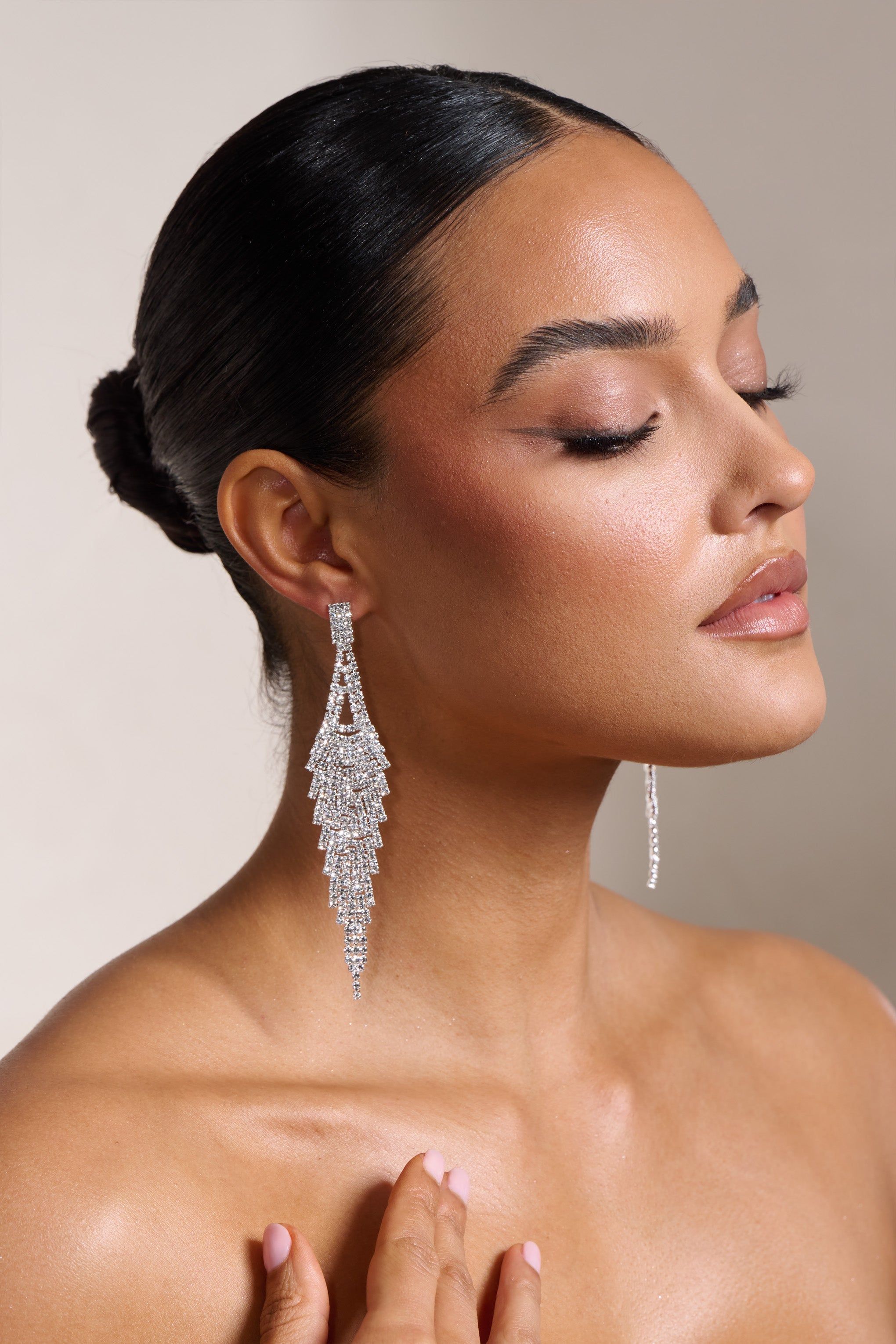 Anita | Silver Diamante Drop Earrings sold by Club L London