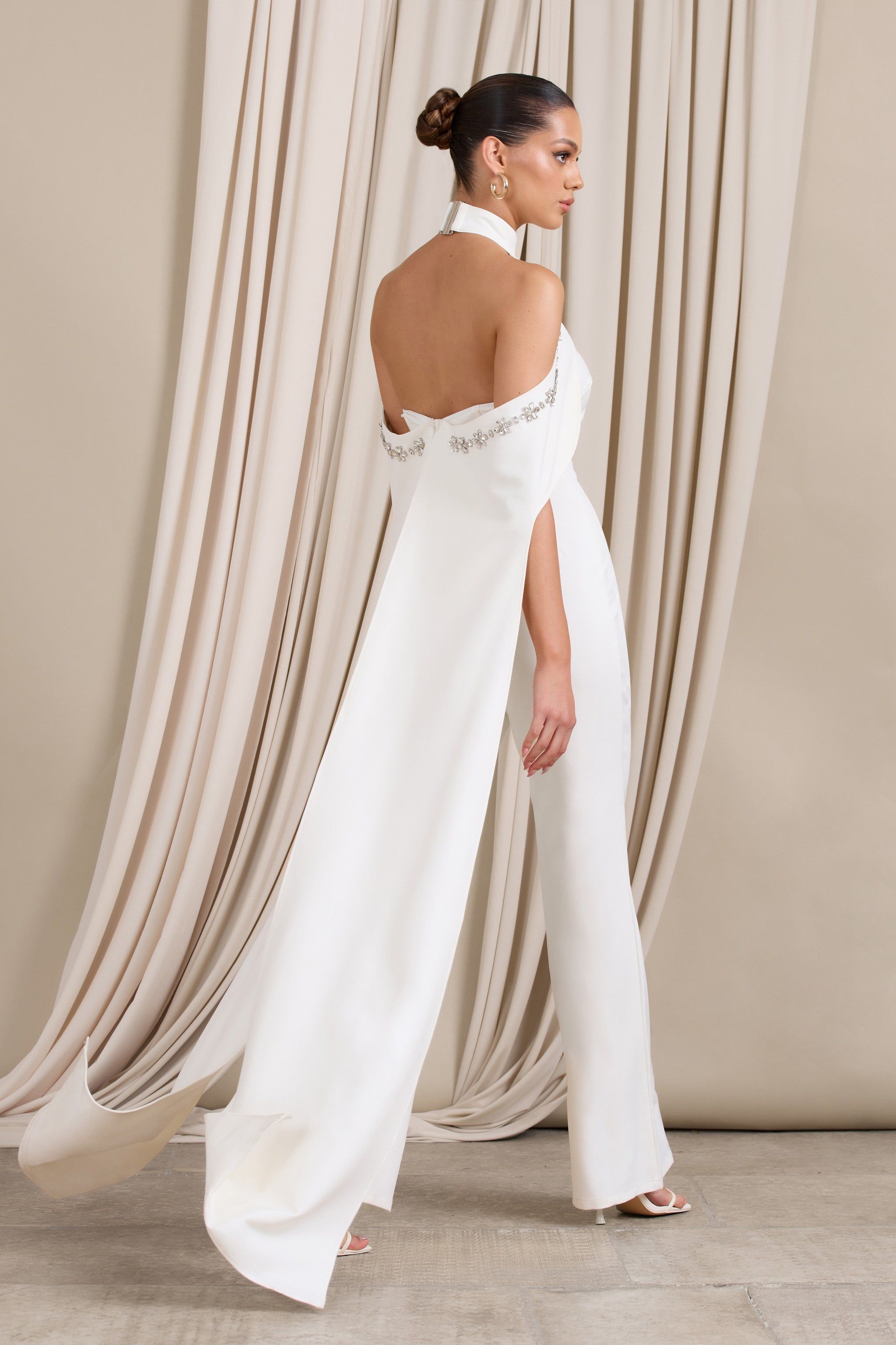 Angel | White High Neck Jumpsuit with Cold Shoulder Cape Sleeves sold by Club L London product image thumbnail 2