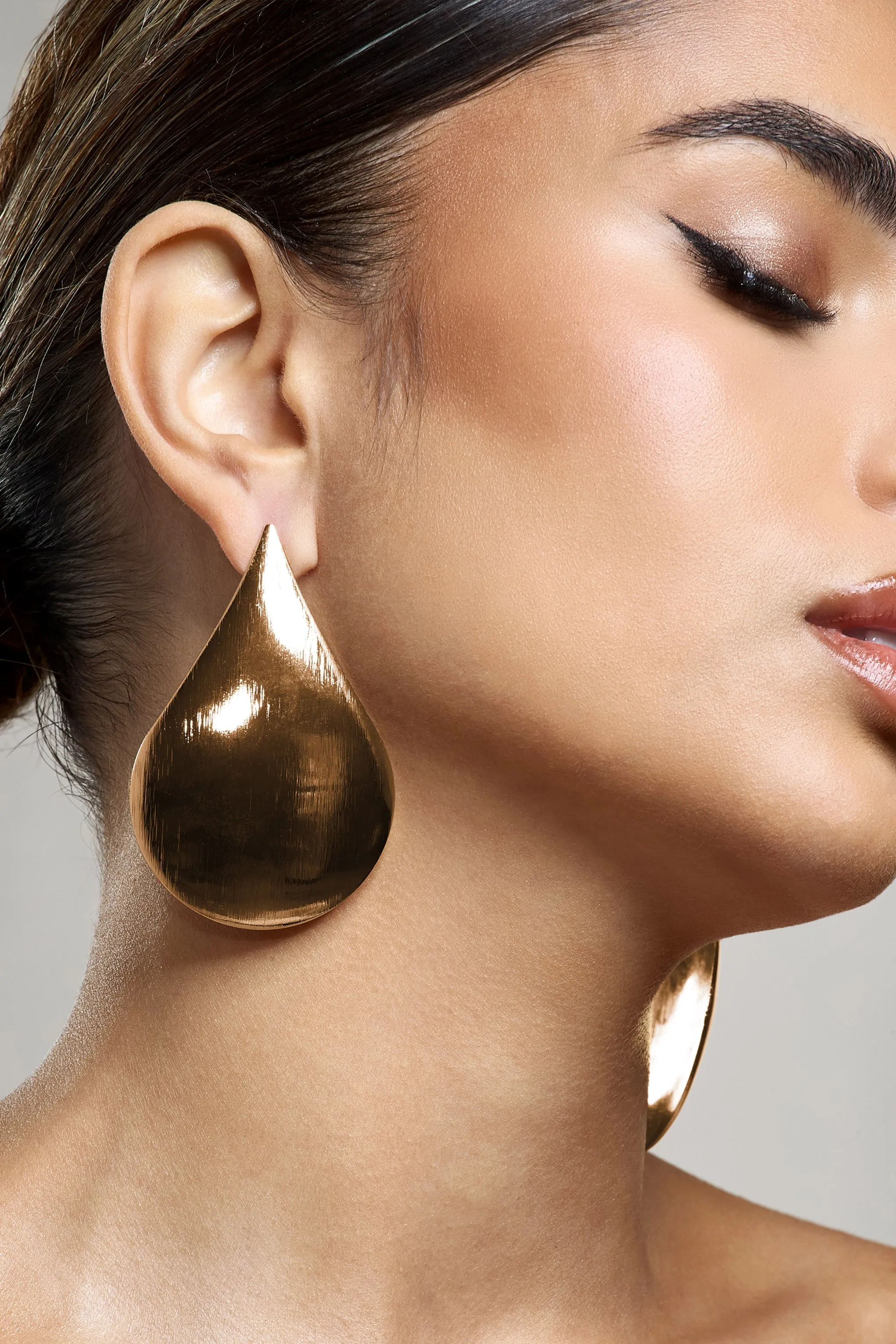 Droplet | Gold Statement Teardrop Earrings sold by Club L London product image thumbnail 4