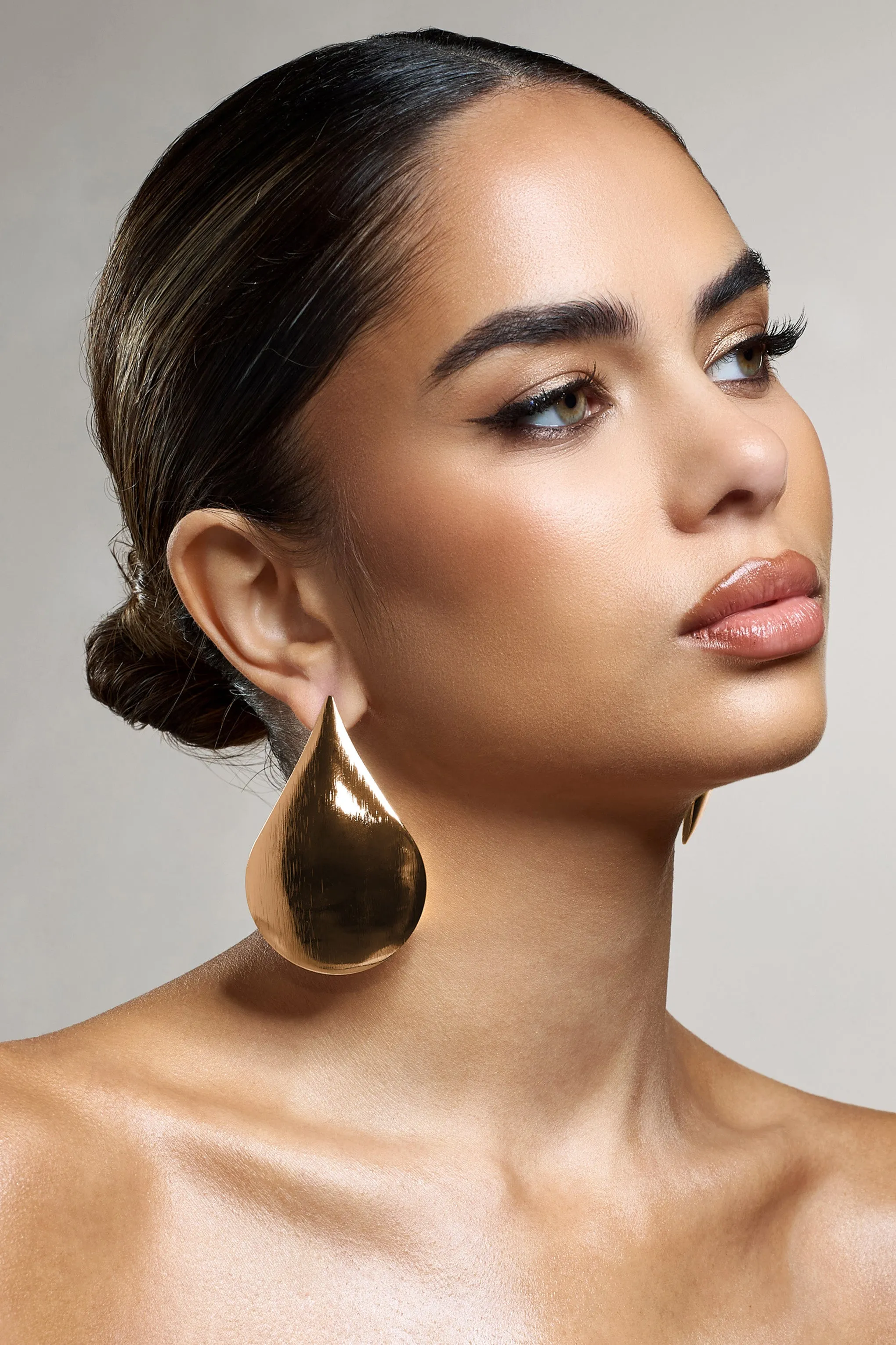 Droplet | Gold Statement Teardrop Earrings sold by Club L London product image thumbnail 3