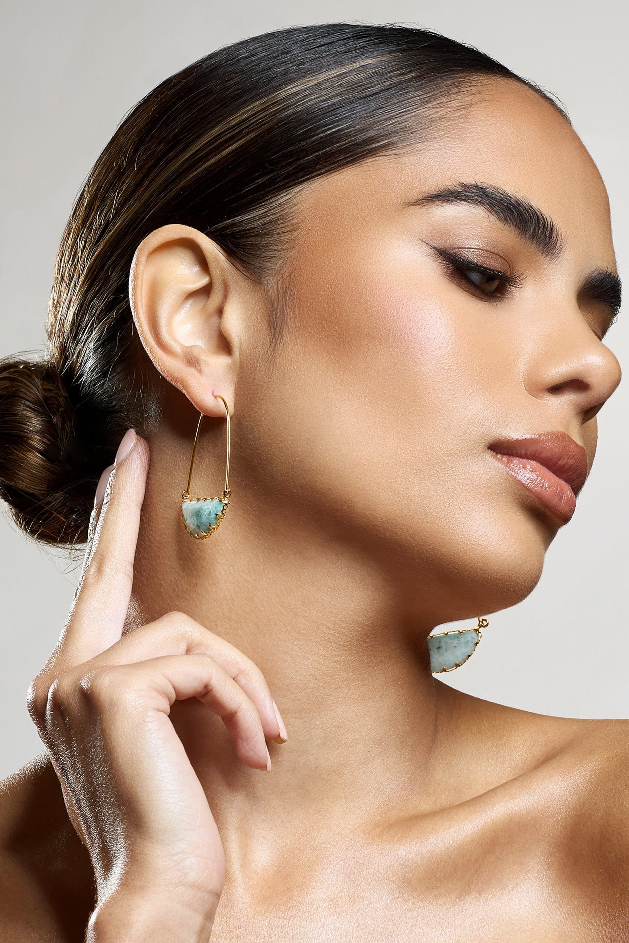 Hettie | Turquoise Crystal Statement Earrings sold by Club L London