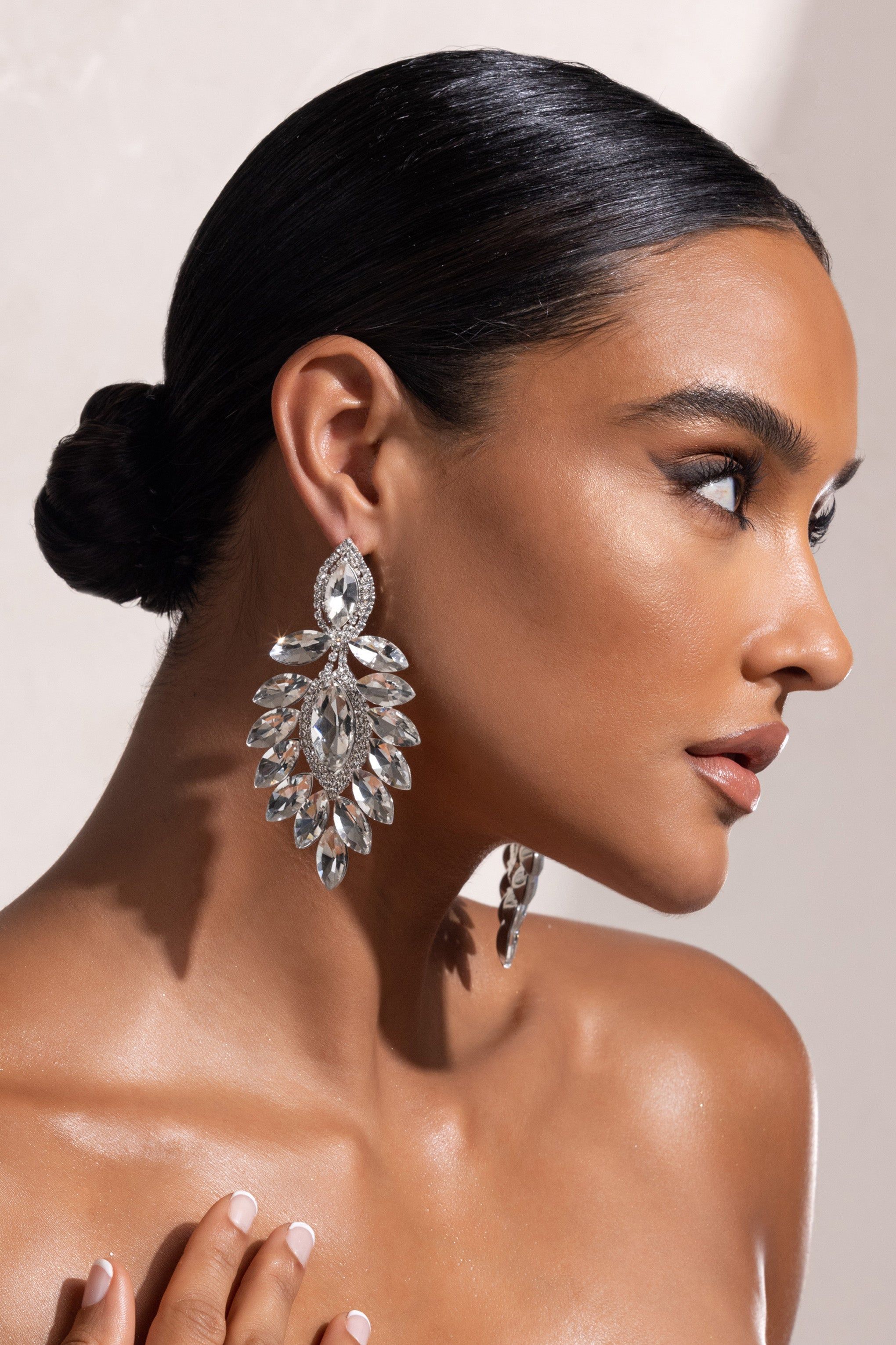 Vallea | Silver Crystal Teardrop Drop Earrings sold by Club L London