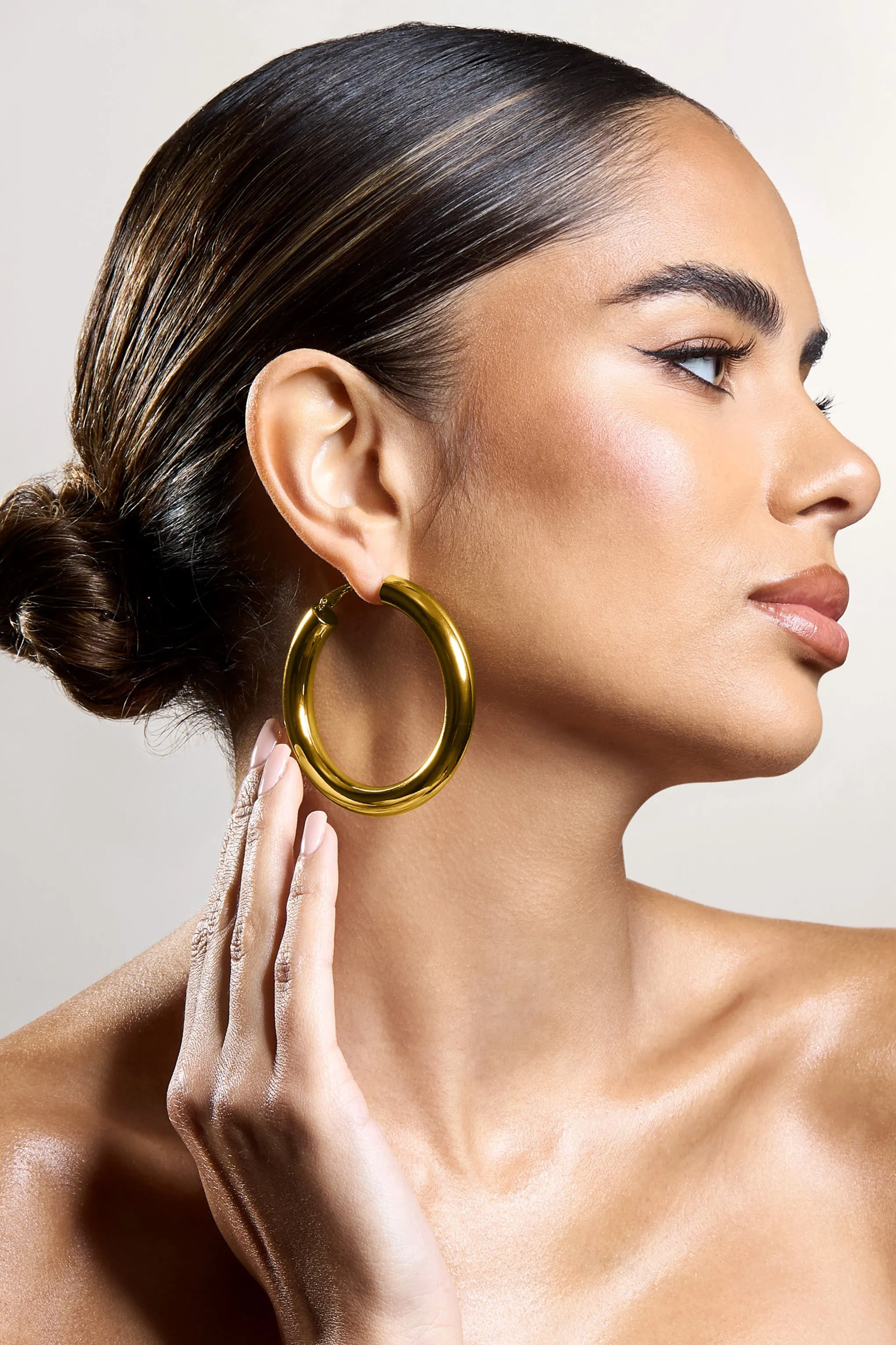 Logan | Gold Chunky Hoop Earrings sold by Club L London product image thumbnail 2