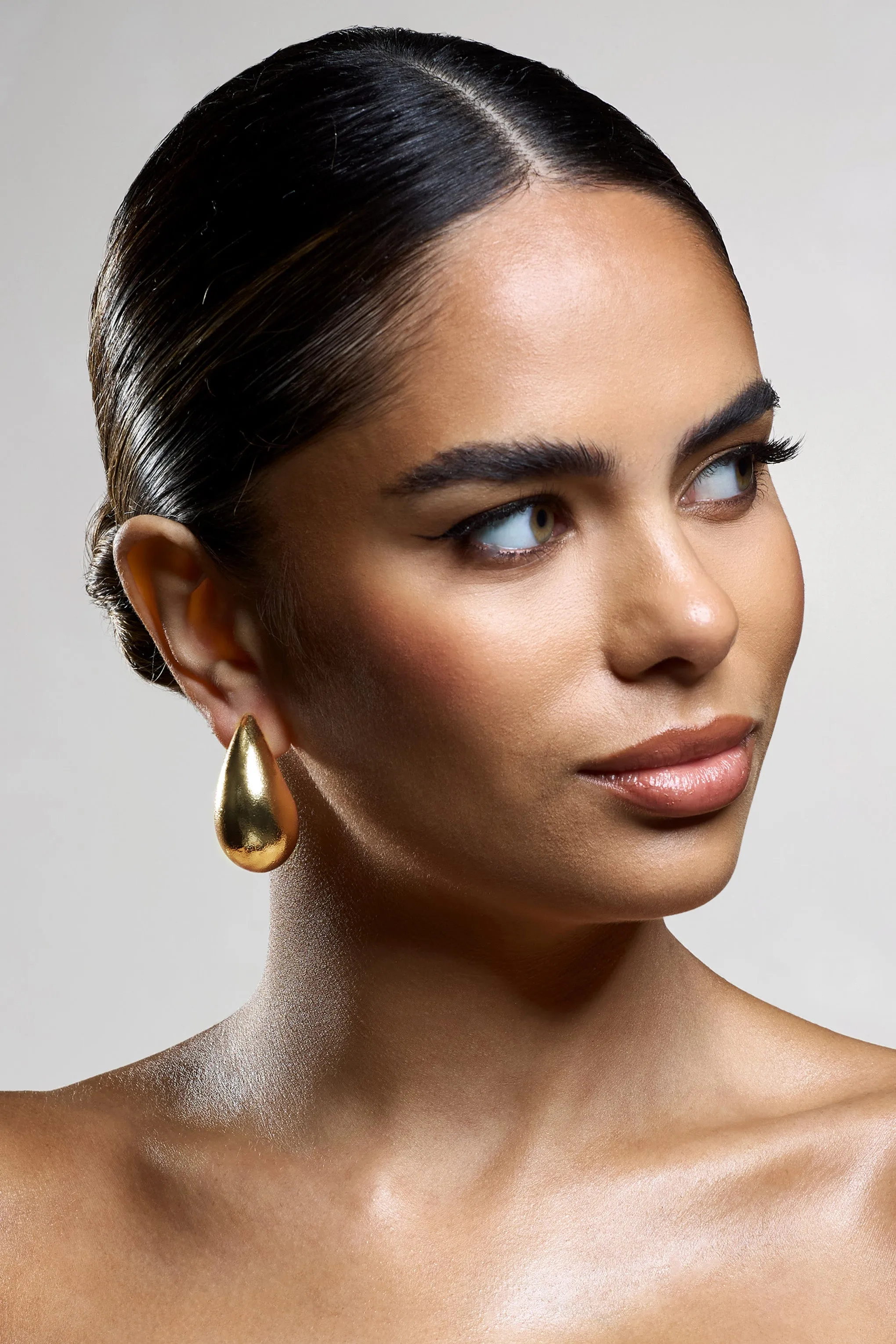 Normani | Rose Gold Textured TearDrop Earrings sold by Club L London product image thumbnail 2