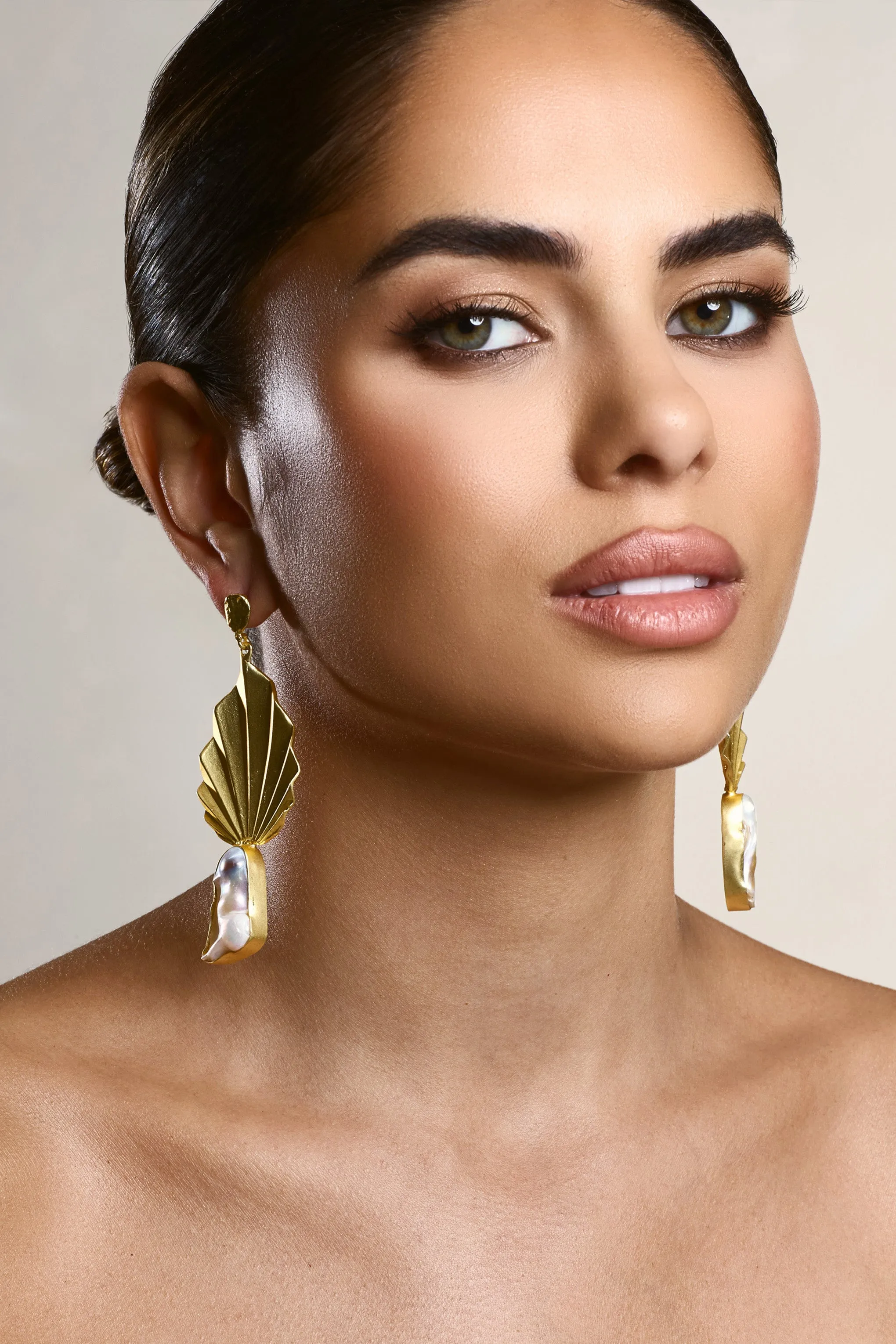 Aloha | Gold Leaf Drop Earrings With Iridescent Shell sold by Club L London product image thumbnail 2