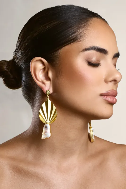 Aloha | Gold Leaf Drop Earrings With Iridescent Shell sold by Club L London