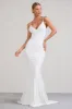 Endless Love | White Backless Knot Detail Fishtail Maxi Dress sold by Club L London